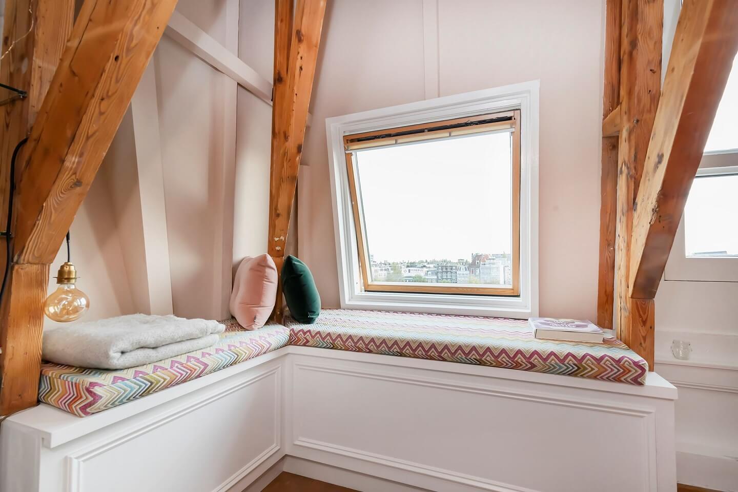 A Colorful Loft in Amsterdam with Exposed Wooden Beams 4 window-seat-wooden-beams-nordroom
