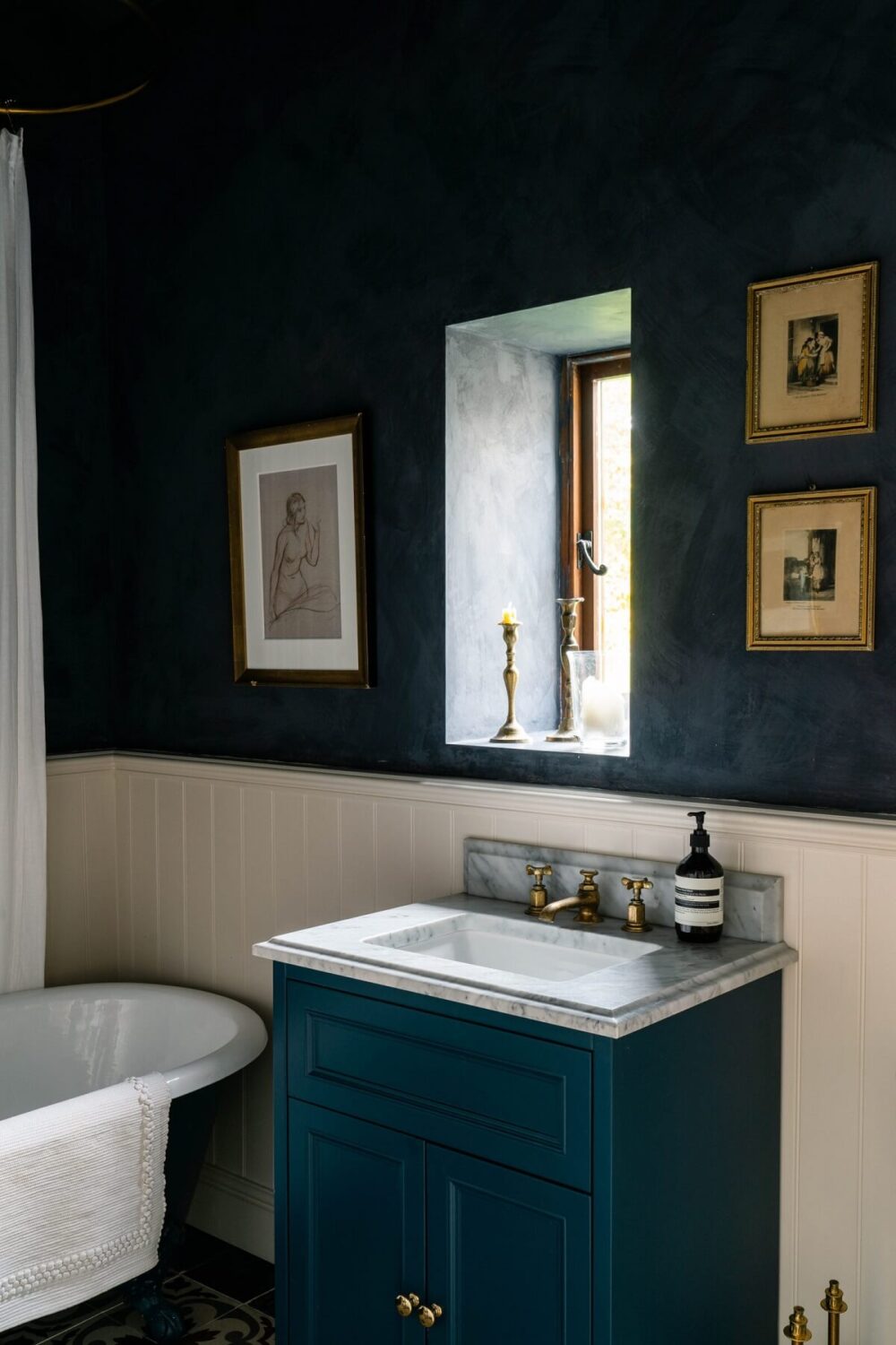 An English Barn Conversion Decorated in Green and Blue 15 bathroom-blue-walls-vanity-nordroom