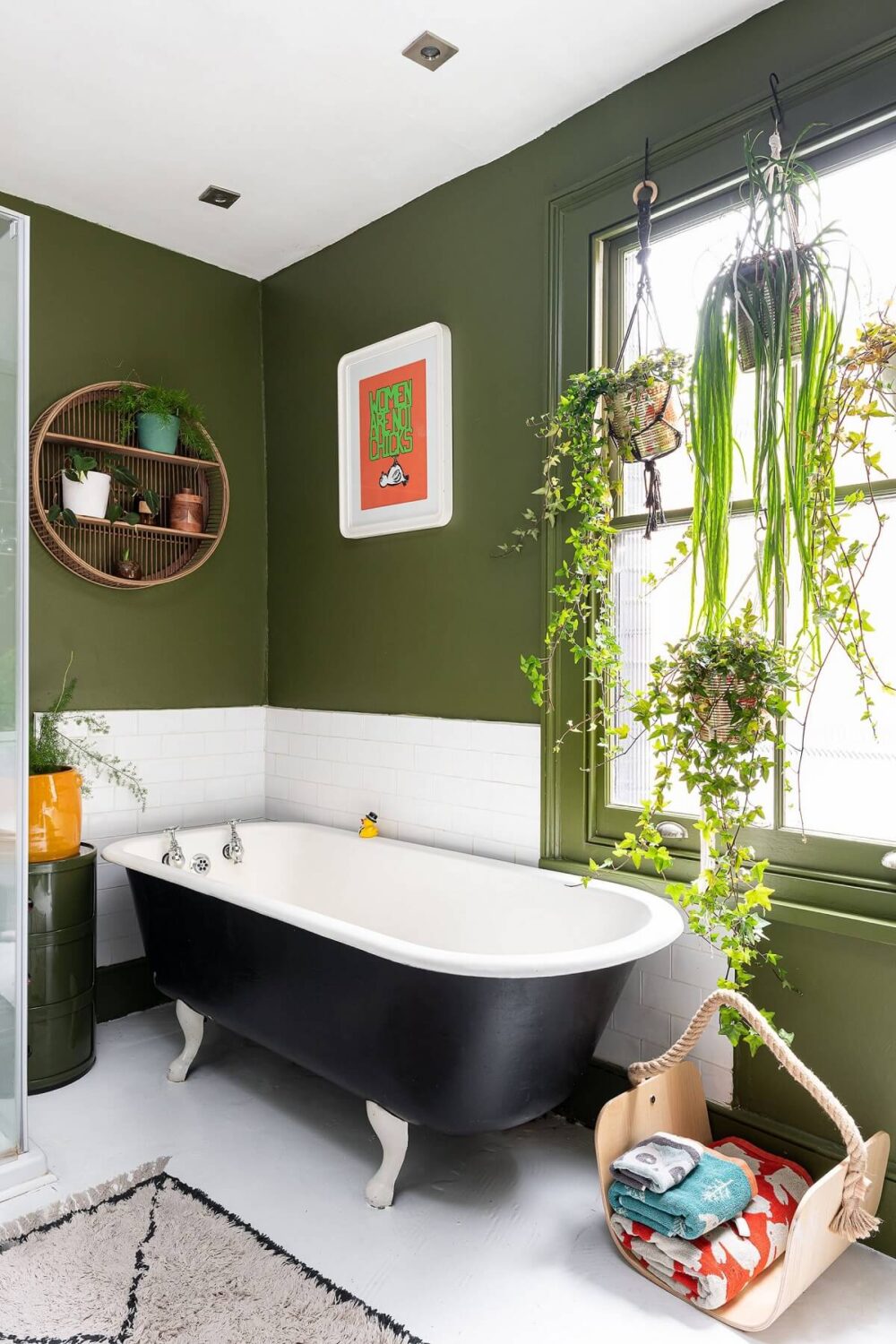 Color Blocked Walls in a Unique Victorian House 21 bathroom-green-walls-black-clawfoot-bath-plants-nordroom