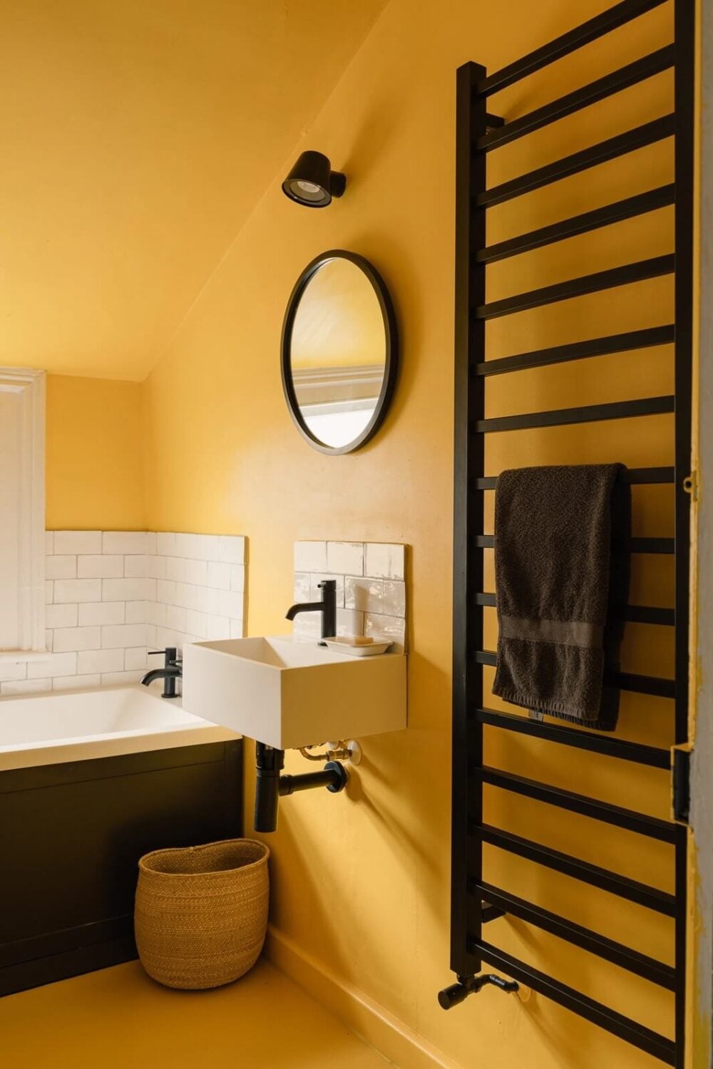 A Victorian House in London with Yellow Color Accents 21 bathroom-yellow-walls-ceiling-floor-black-fittings-nordroom