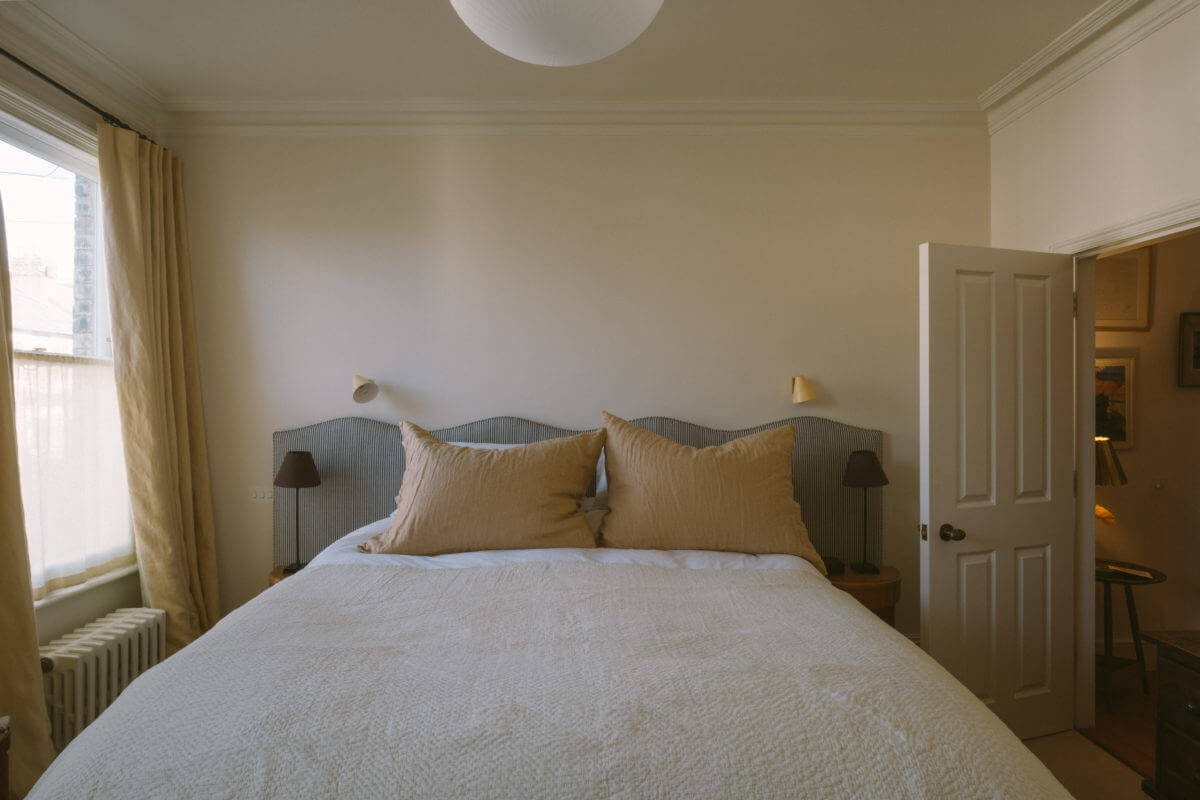 A Victorian House in London with a Blue Sitting Room 23 bedroom-flowing-headboard-nordroom