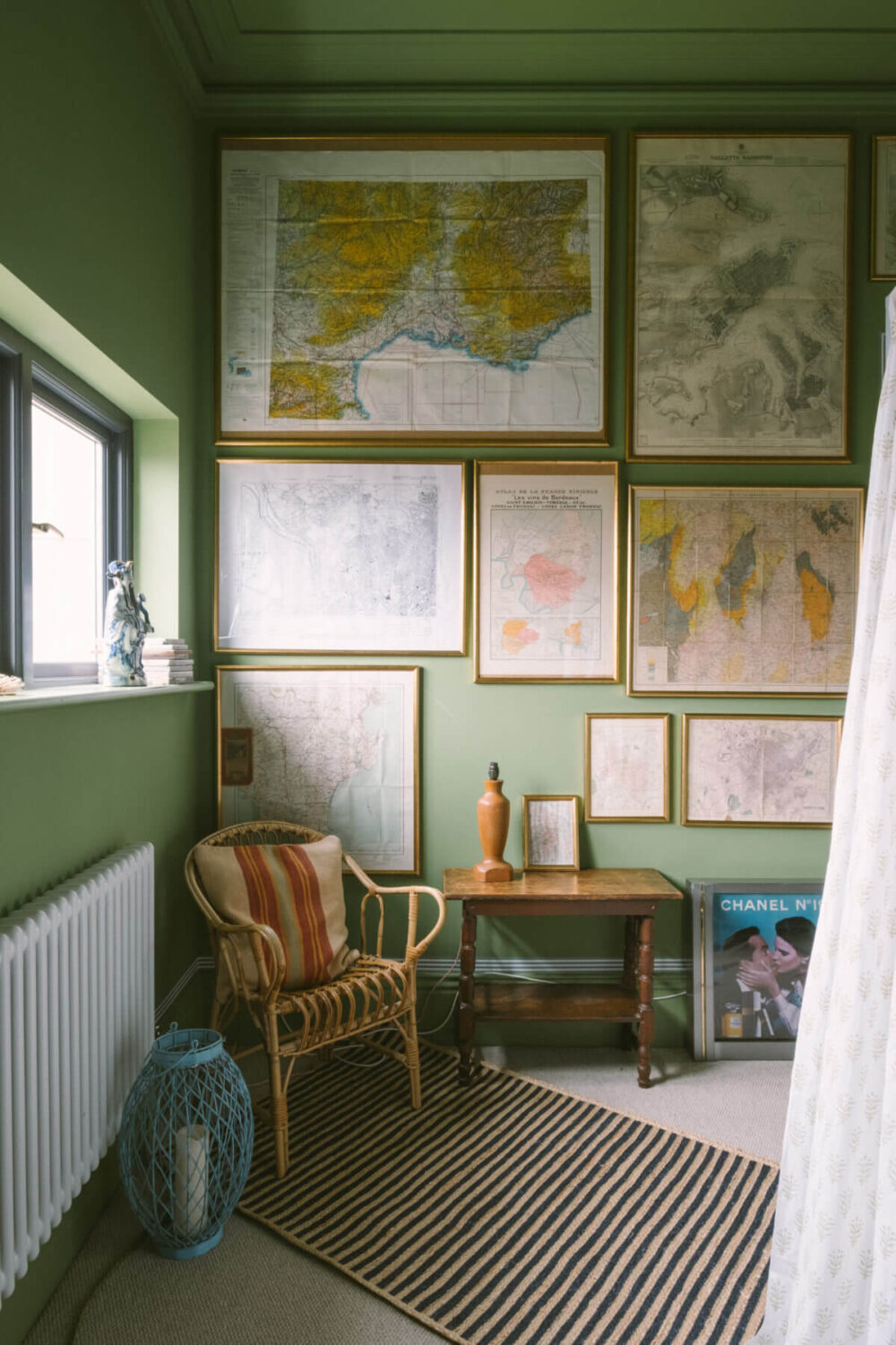 A Colorful Vintage Eclectic Home in England 21 bedroom-map-wall-art-green-walls-nordroom