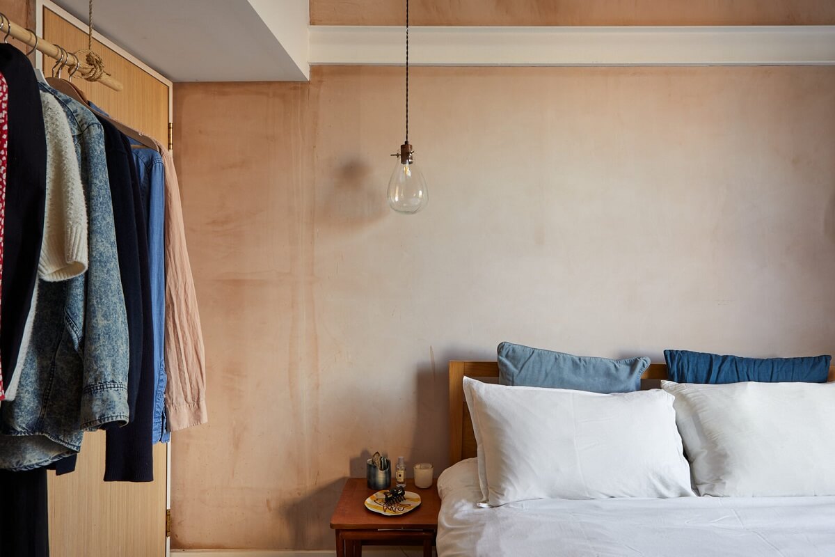 A London Home with Plaster Pink Walls and Brick Chimneys 14 bedroom-open-wardrobe-plaster-pink-walls-nordroom
