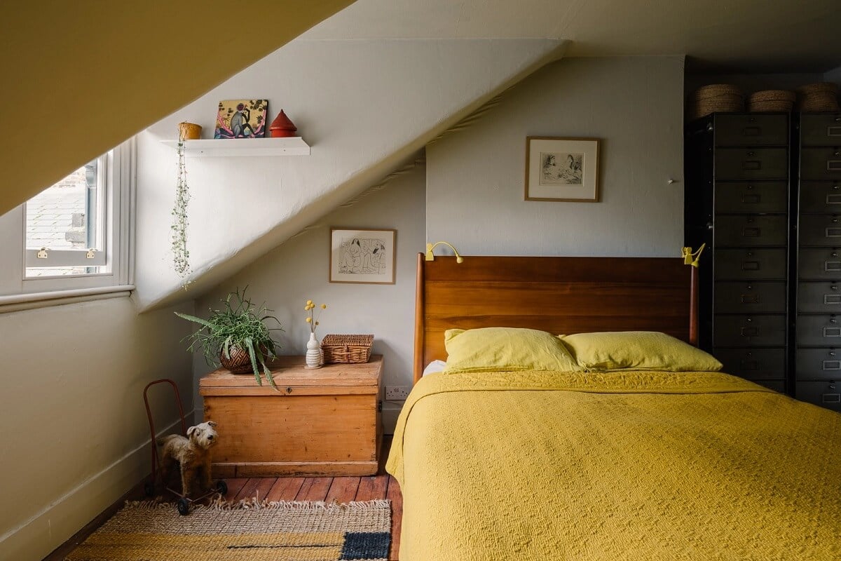 A Victorian House in London with Yellow Color Accents 17 bedroom-slanted-ceiling-yellow-color-accents-nordroom