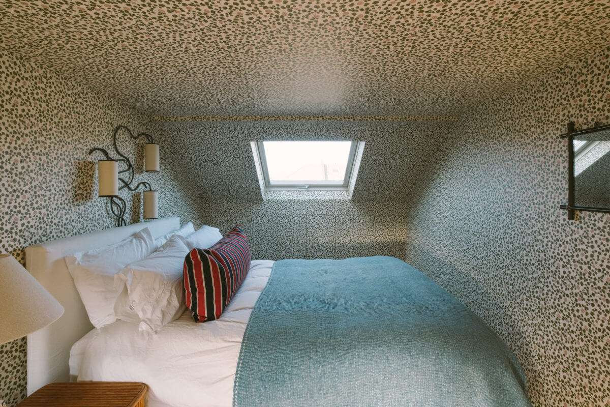 A Victorian House in London with a Blue Sitting Room 30 bedroom-wallpaper-slanted-ceiling-skylight-nordroom