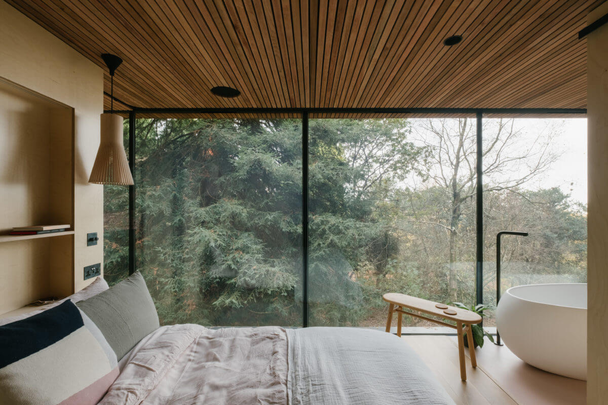 A Modern Woodland Lodge with A Scandi Interior 11 bedroom-wooden-ceiling-scandi-style-lodge-nordroom
