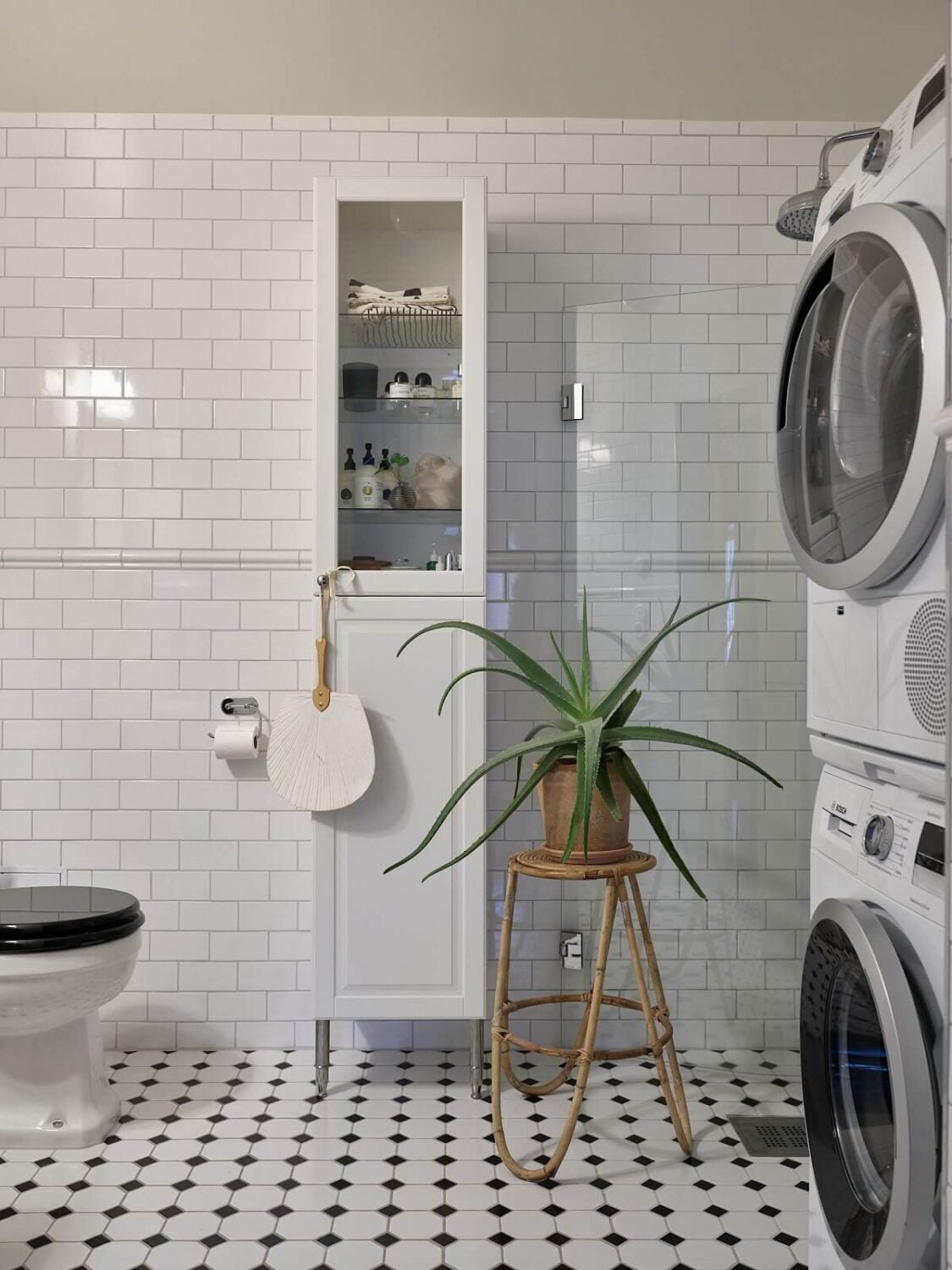A Swedish Maisonette with a Charming Kitchen 19 black-white-bathroom-laundry-room-nordroom