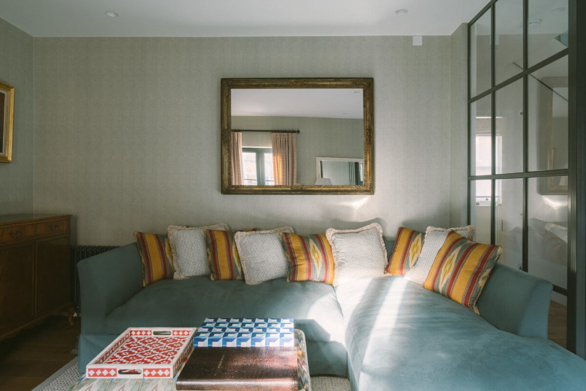 A London Mews House Made Famous in Love Actually 17 blue-sofa-steel-glass-wall-notting-hill-london-mews-house-nordroom