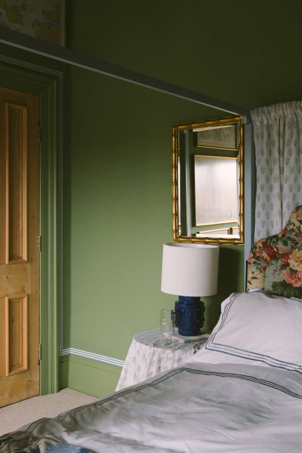 A Colorful Vintage Eclectic Home in England 22 canopy-bed-green-walls-vintage-bedroom-nordroom