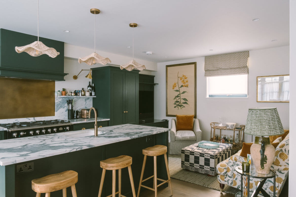 A London Mews House Made Famous in Love Actually 4 dark-green-kitchen-cabinets-seating-area-nordroom