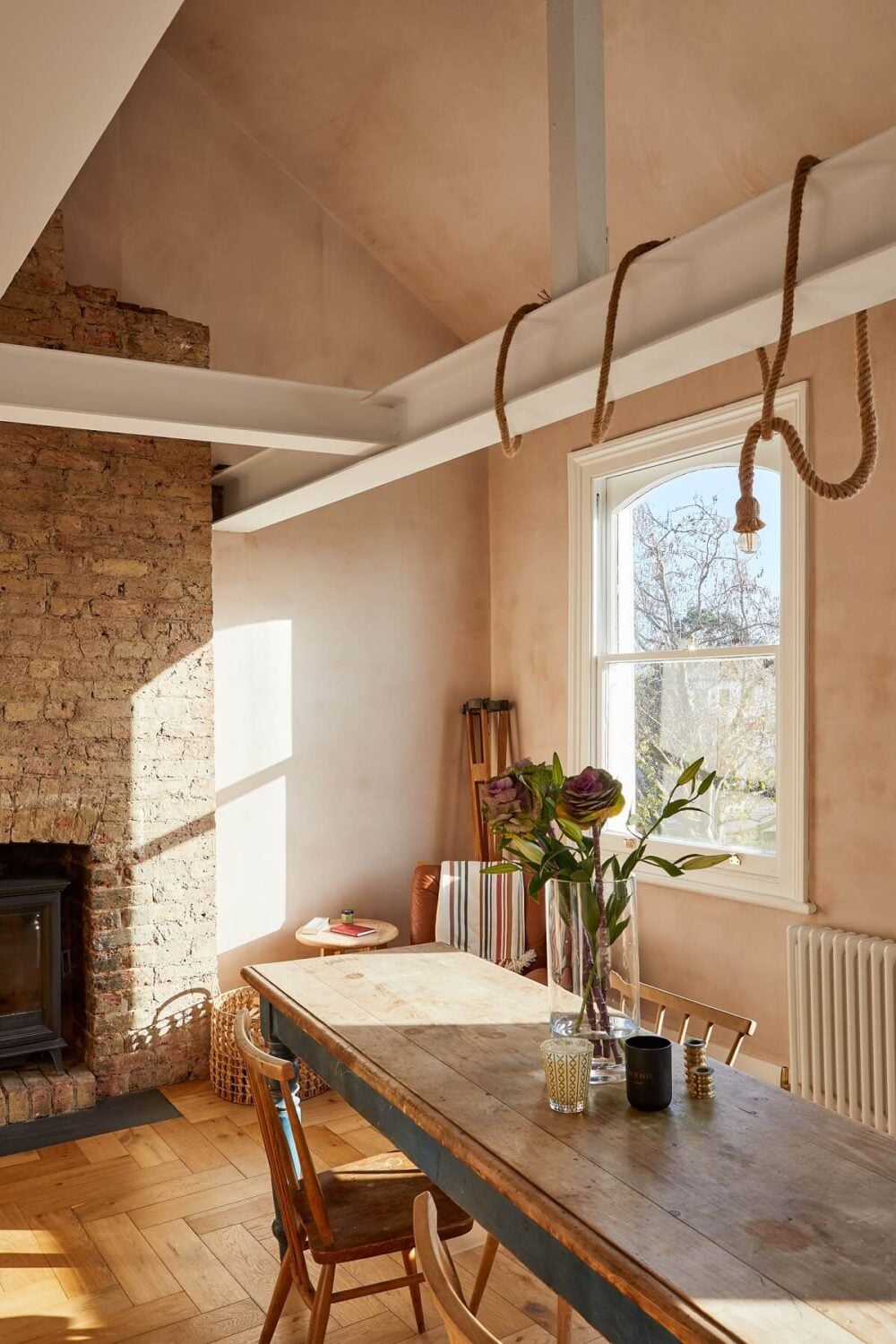 Home Decor Trends 2021: A Comfortable Home 29 dining-room-brick-wall-fireplace-high-ceilings-plaster-walls-nordroom