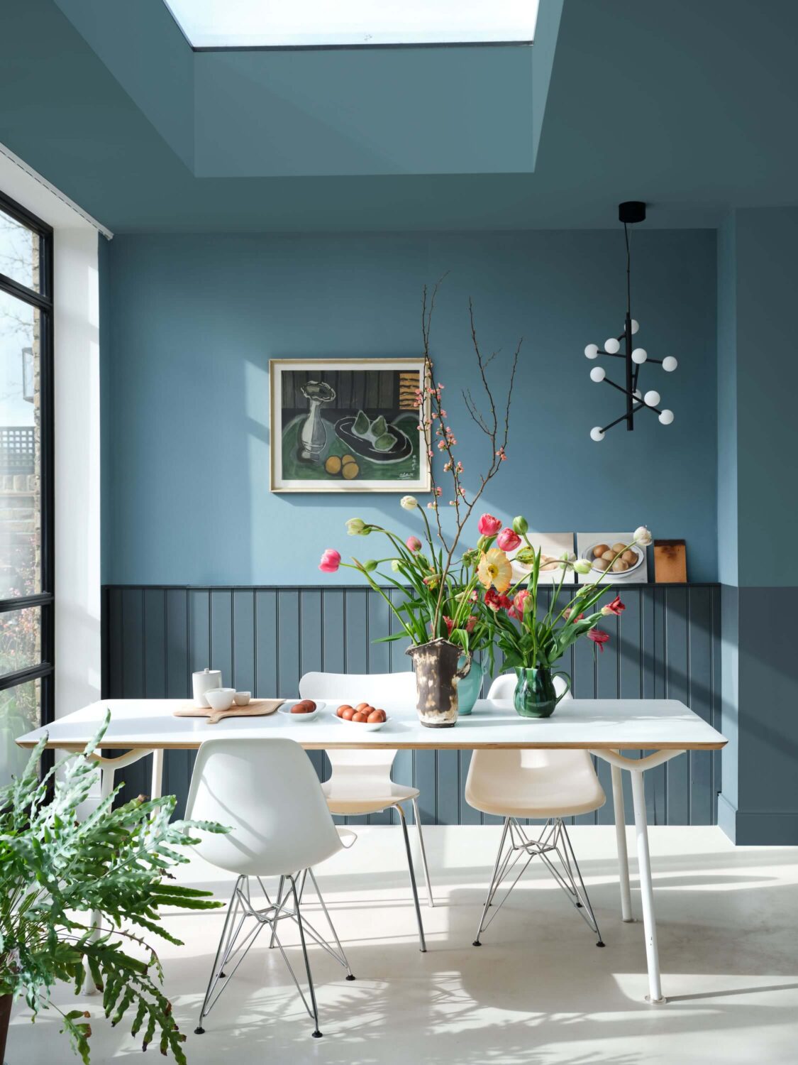 Two-Tone Walls Ideas: Create A Color Blocking Accent Wall 24 farrow-and-ball-new-colors-selvedge-blue-dining-room-skylight-nordroom