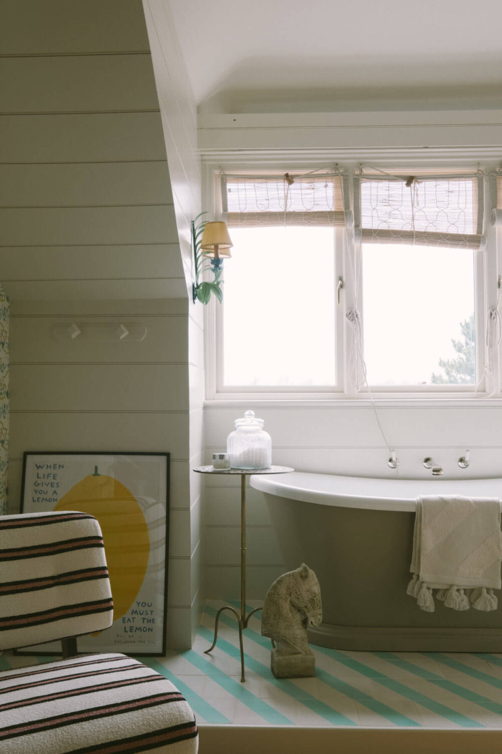 A Colorful Vintage Eclectic Home in England 27 freestanding-bath-blue-white-diagonal-tiles-nordroom