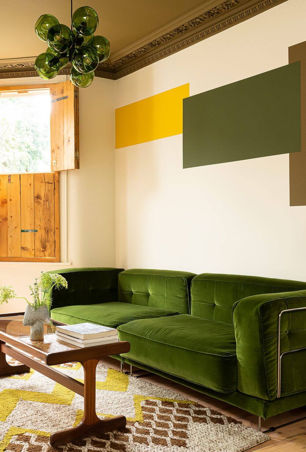 Color Blocked Walls in a Unique Victorian House 2 green-velvet-sofa-color-blocked-walls-olive-green-ceiling-nordroom