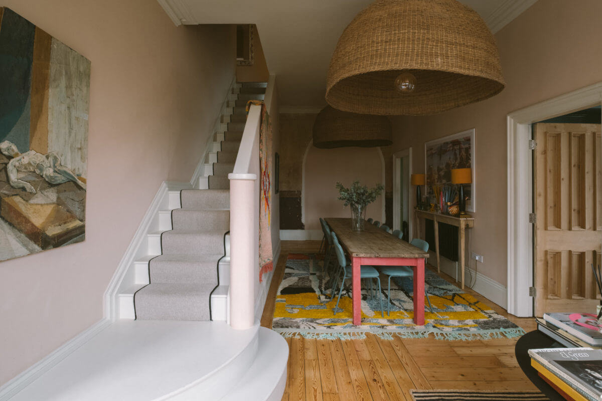 A Colorful Vintage Eclectic Home in England 17 hallway-dining-room-rustic-farmhouse-table-rugs-nordroom