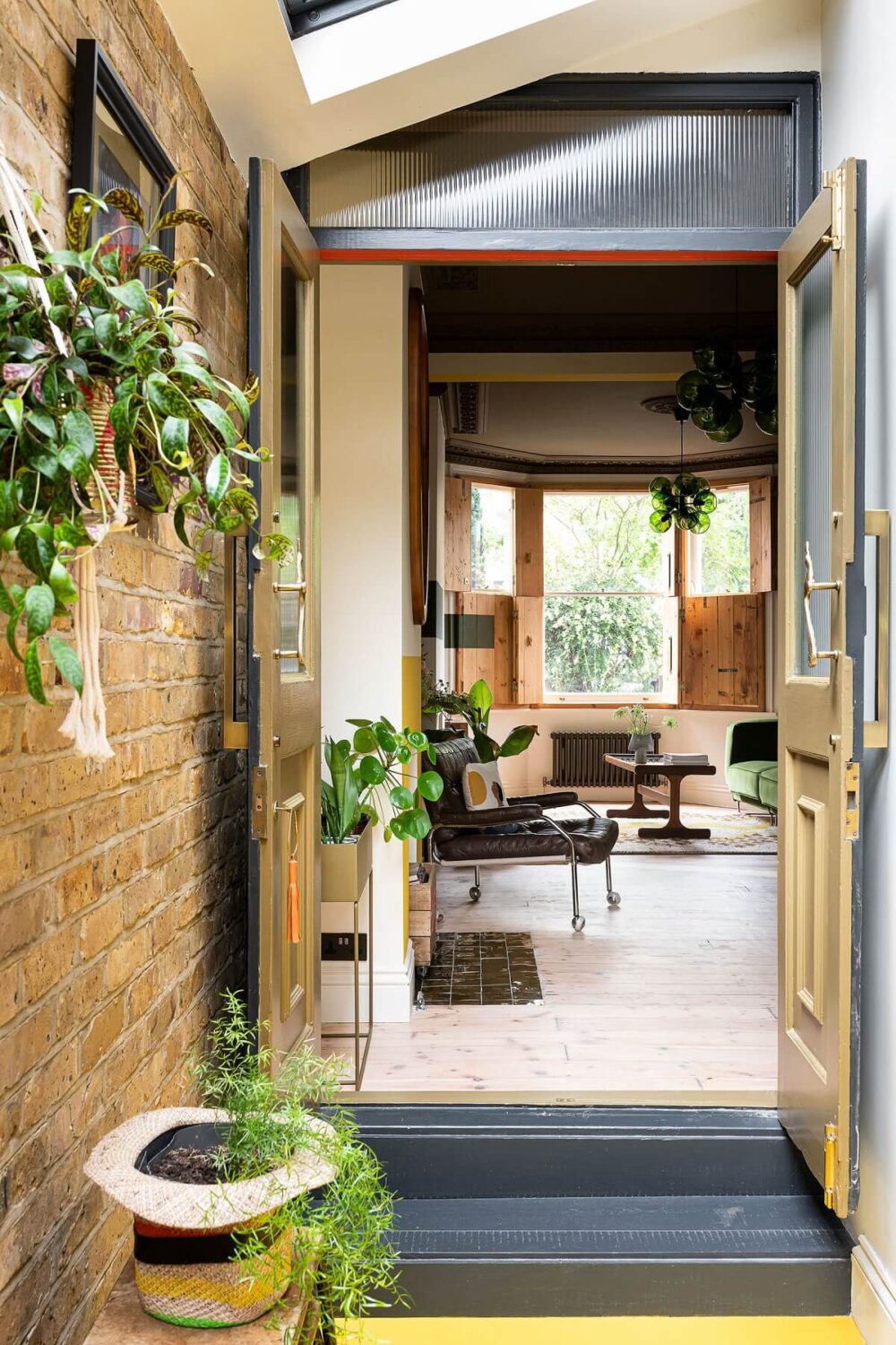 Color Blocked Walls in a Unique Victorian House 8 hallway-exposed-brick-wall-colorful-home-nordroom