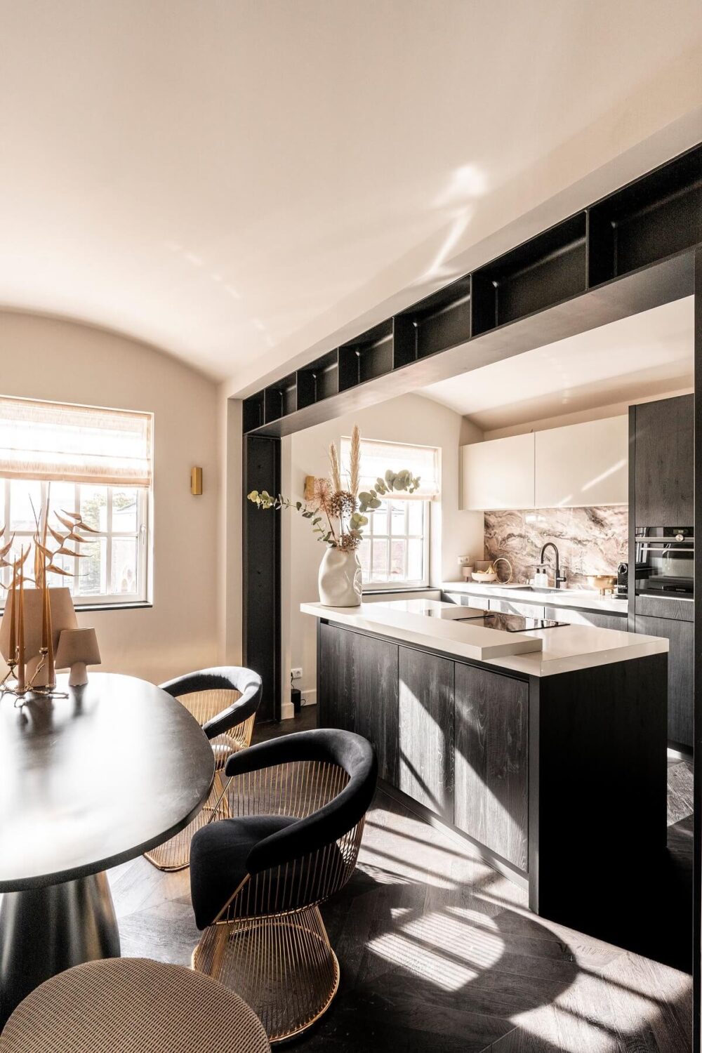 A Stylish Monochrome Penthouse in a Former Prison Building 10 kitchen-black-cabinets-dinng-area-nordroom