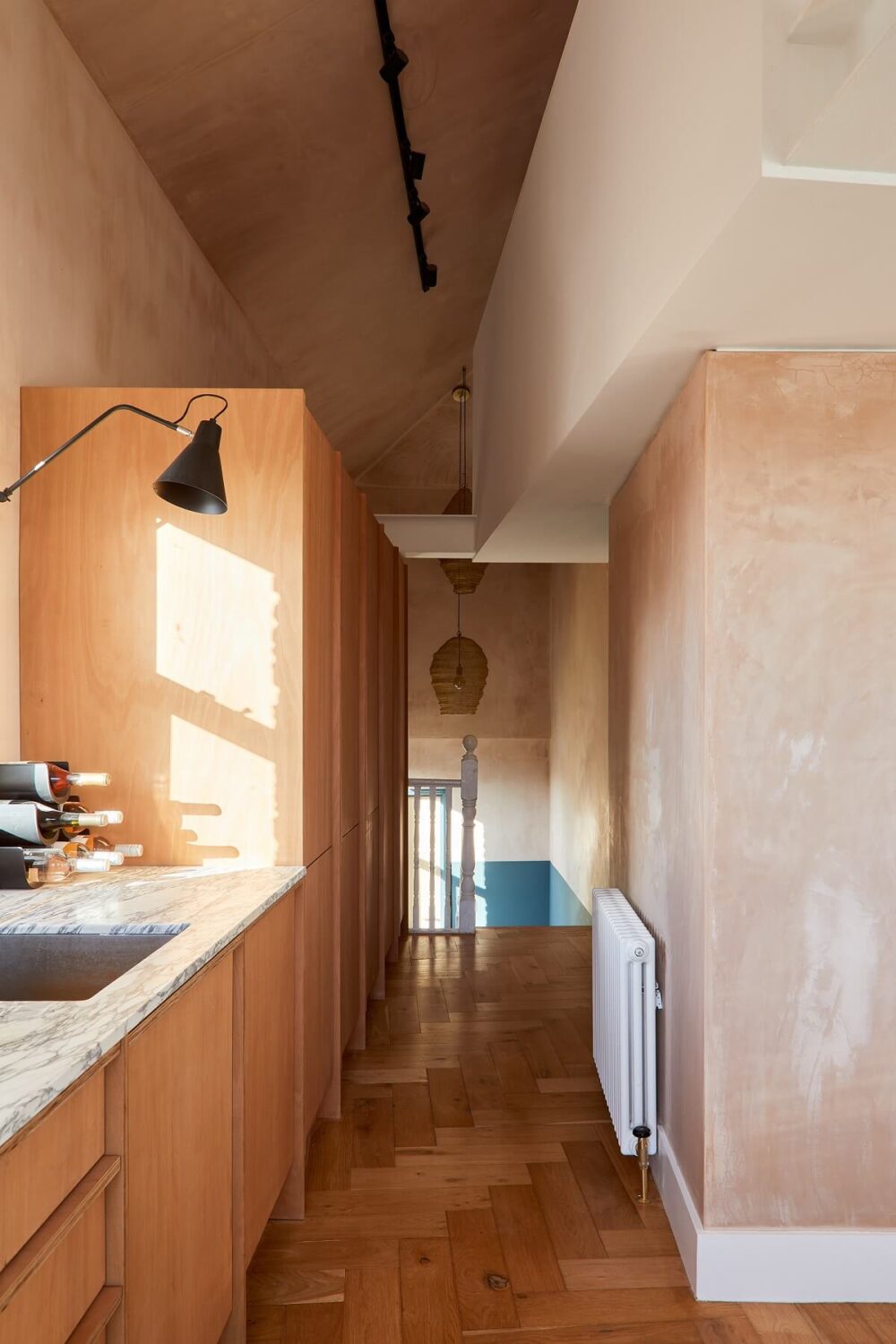 A London Home with Plaster Pink Walls and Brick Chimneys 12 kitchen-herringbone-wooden-floor-plaster-pink-walls-nordroom
