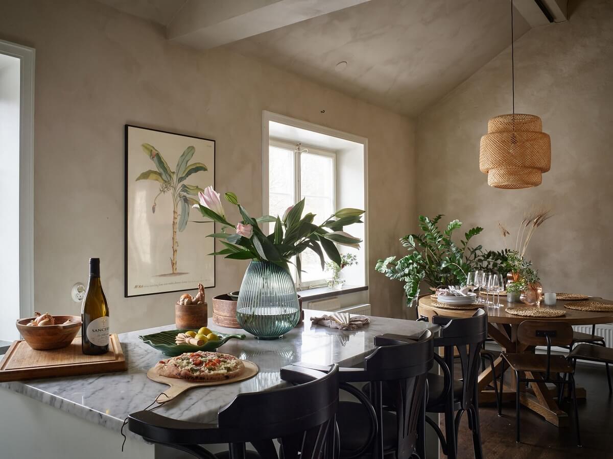 A Swedish Maisonette with a Charming Kitchen 6 kitchen-island-round-wooden-table-chalk-paint-walls-nordroom
