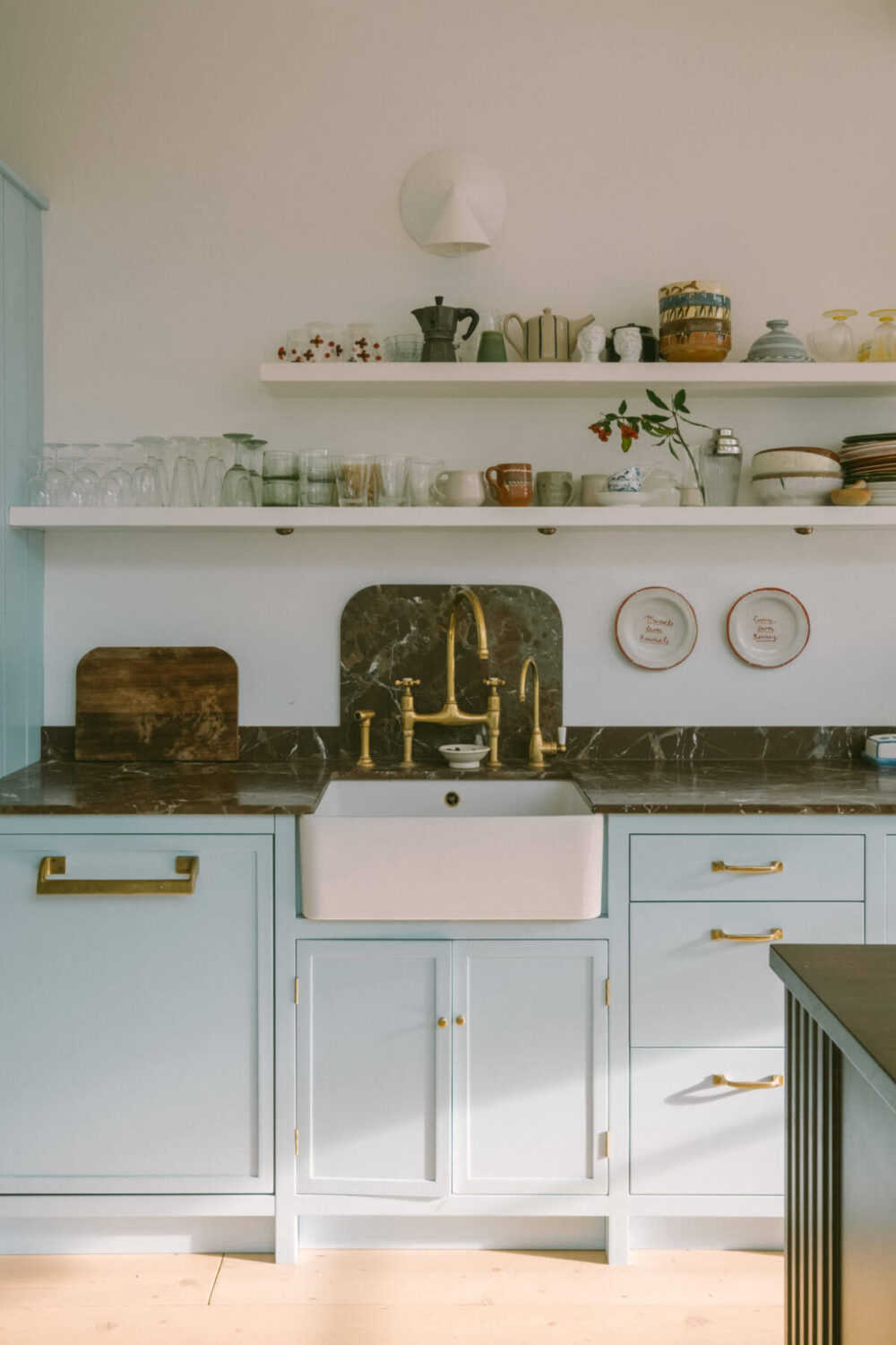 A Victorian House in London with a Blue Sitting Room 12 kitchen-light-blue-cabinets-butler-sink-shelves-nordroom