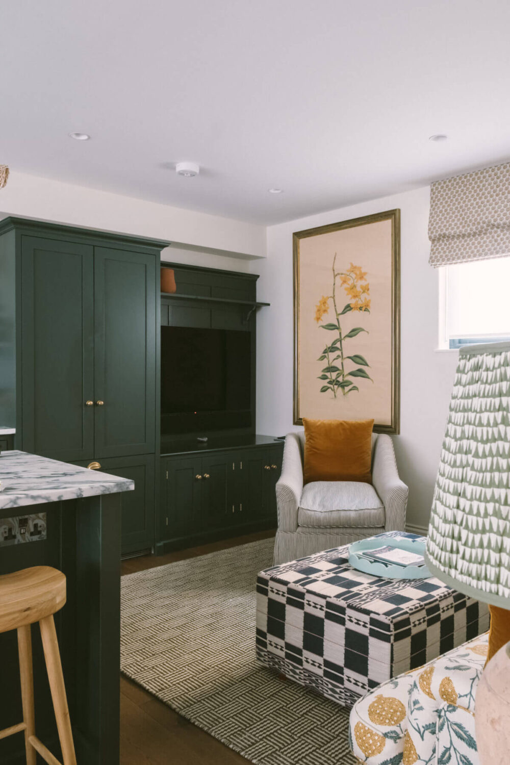 A London Mews House Made Famous in Love Actually 7 kitchen-seating-dark-green-cabinets-nordroom