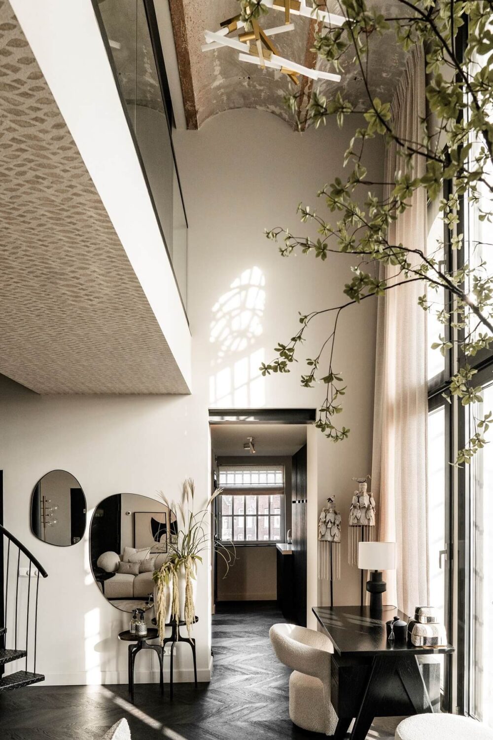 A Stylish Monochrome Penthouse in a Former Prison Building 9 loft-living-space-vaulted-ceiling-nordroom