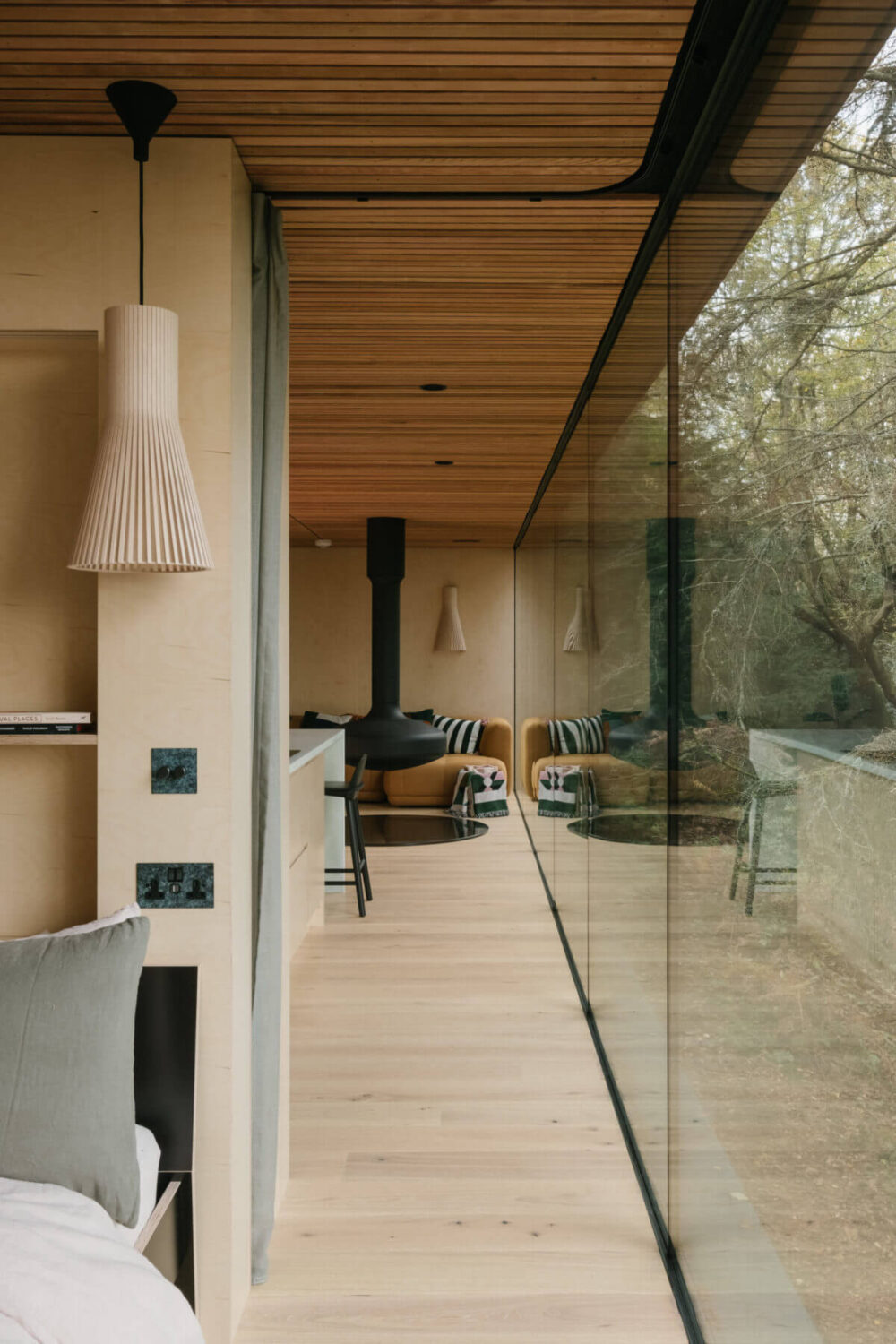A Modern Woodland Lodge with A Scandi Interior 9 loft-style-lodge-floor-to-ceiling-windows-nordic-design-nordroom