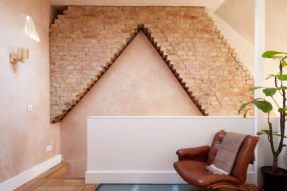 A London Home with Plaster Pink Walls and Brick Chimneys 11 mezzanine-living-room-brick-walls-nordroom