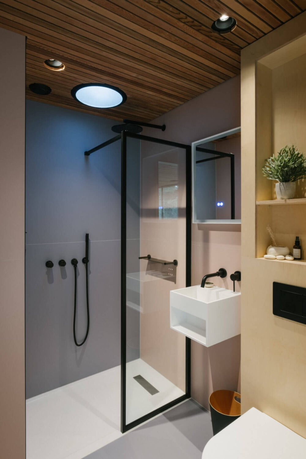 A Modern Woodland Lodge with A Scandi Interior 15 modern-bathroom-wooden-ceiling-walk-in-shower-nordroom