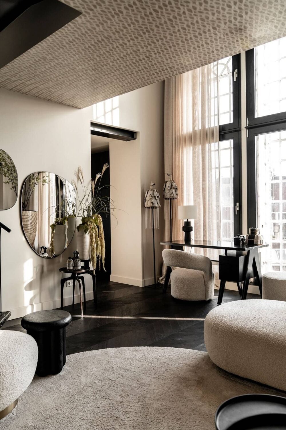 Herringbone vs. Chevron Flooring Patterns: Differences & Inspiration 33 monochrome-living-room-penthouse-wallpaper-ceiling-large-windows-nordroom
