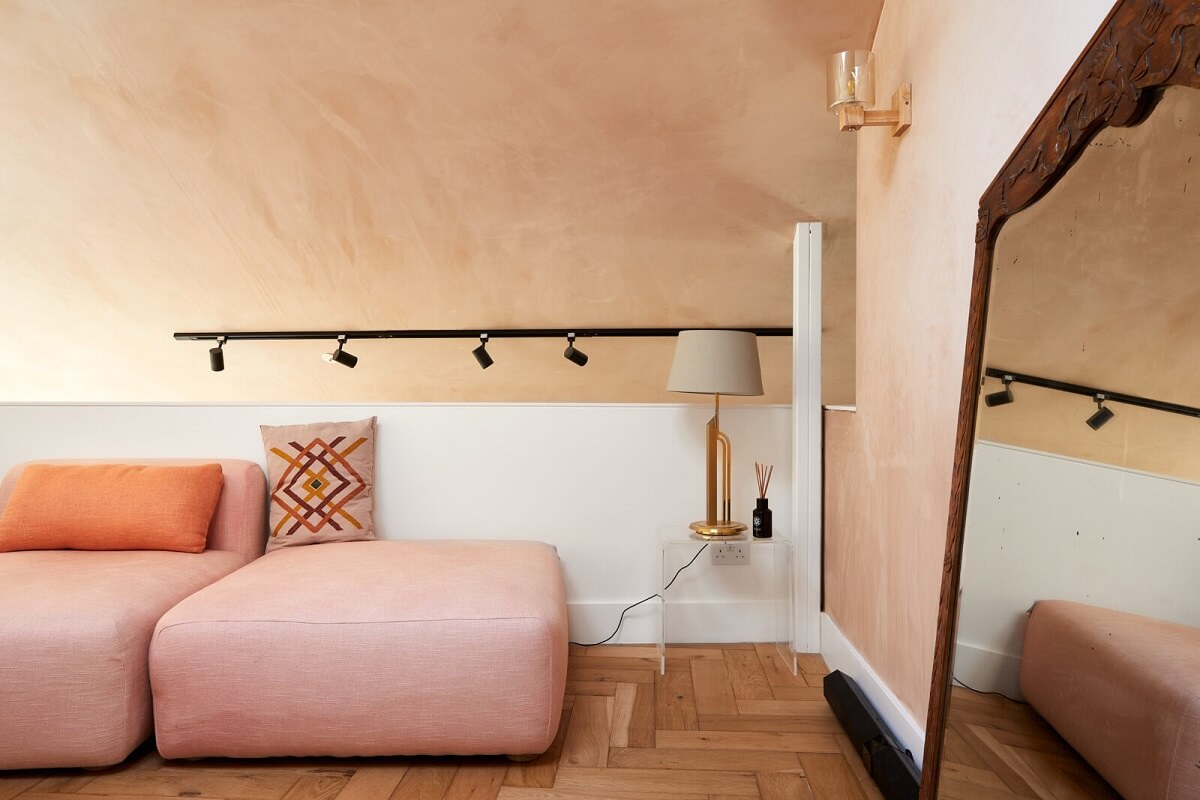 A London Home with Plaster Pink Walls and Brick Chimneys 10 sitting-room-mezzanine-pink-sofa-nodroom