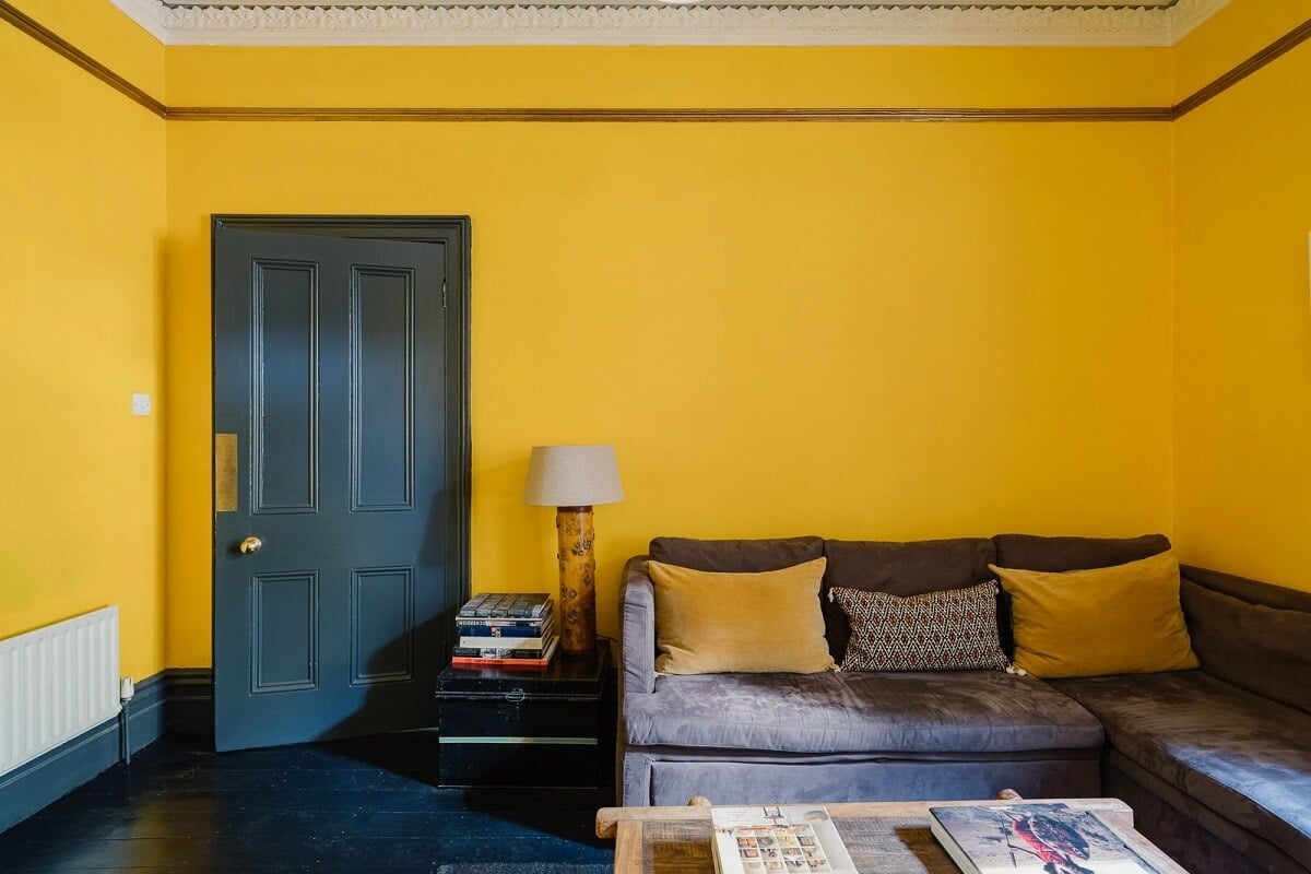 A Victorian House in London with Yellow Color Accents 11 sitting-room-yellow-walls-dark-gray-floorboards-nordroom