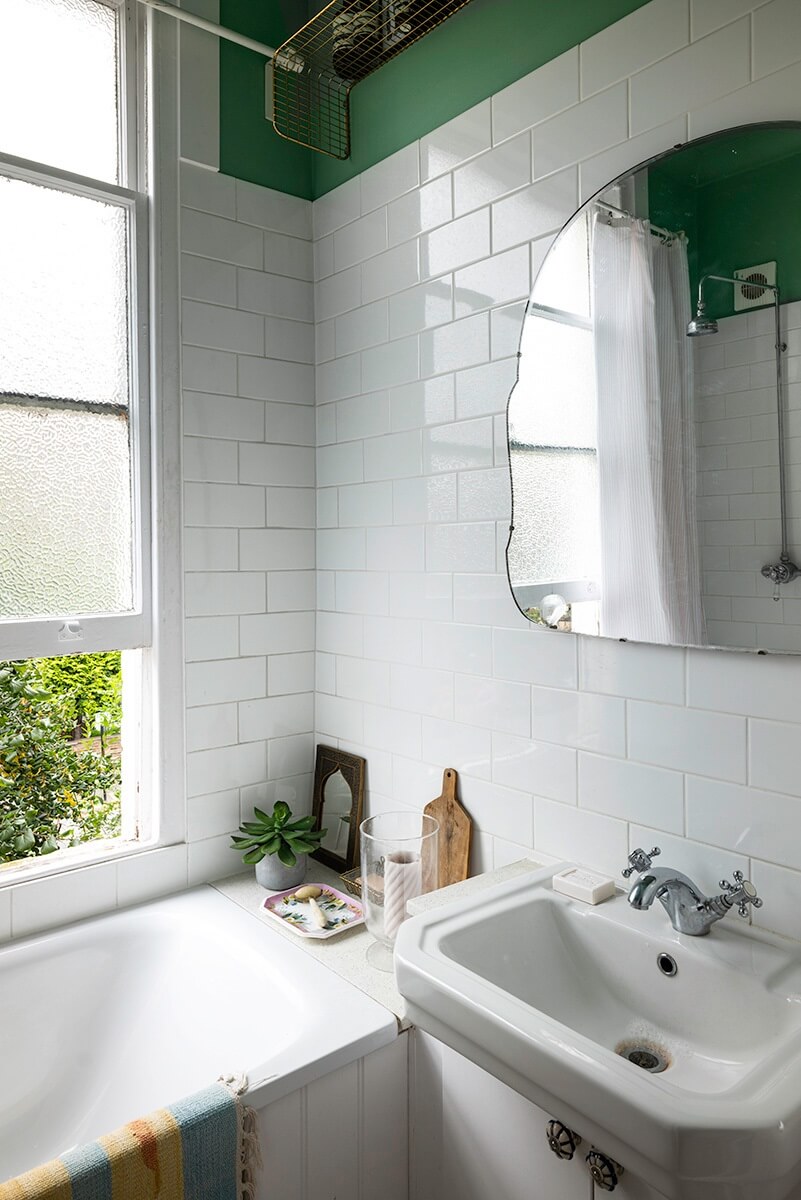 Pastel Colors in a Vintage London Home 13 small-bathroom-white-tiles-green-walls-nordroom