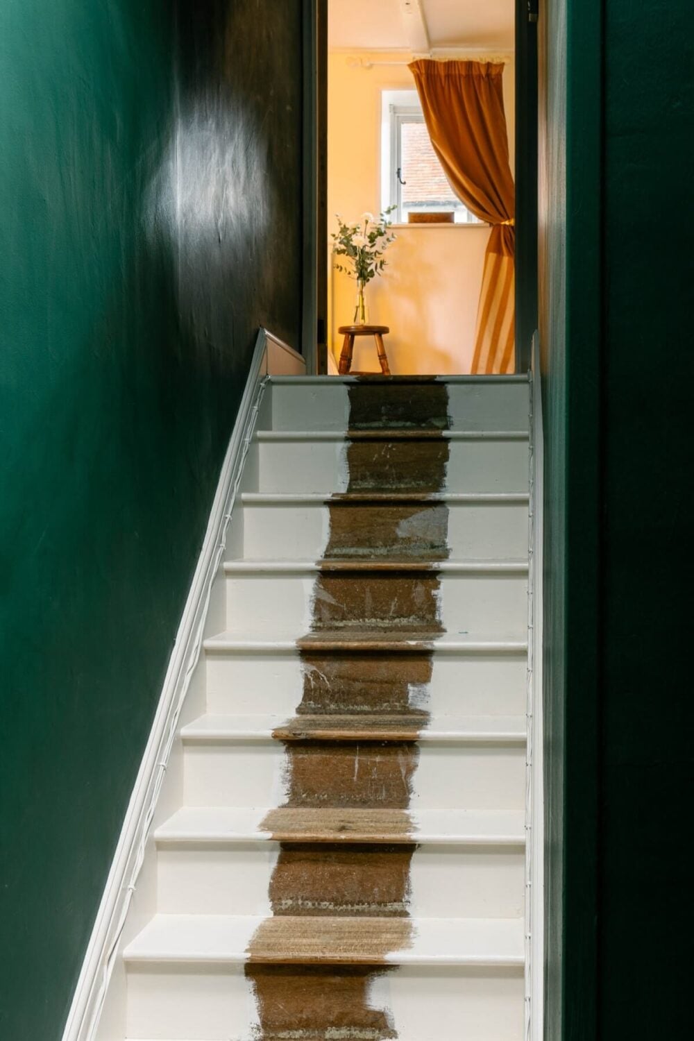 An English Barn Conversion Decorated in Green and Blue 11 staircase-green-walls-half-painted-wooden-stairs-nordroom