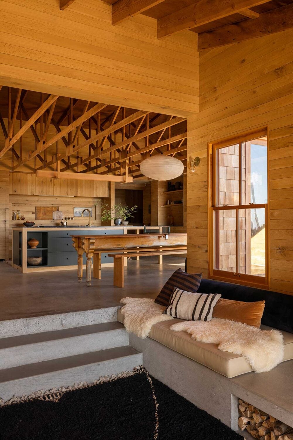 The Warm Mountaintop Home of Actor Hayden Christensen 2 sunken-living-room-kitchen-wooden-mountaintop-home-nordroom