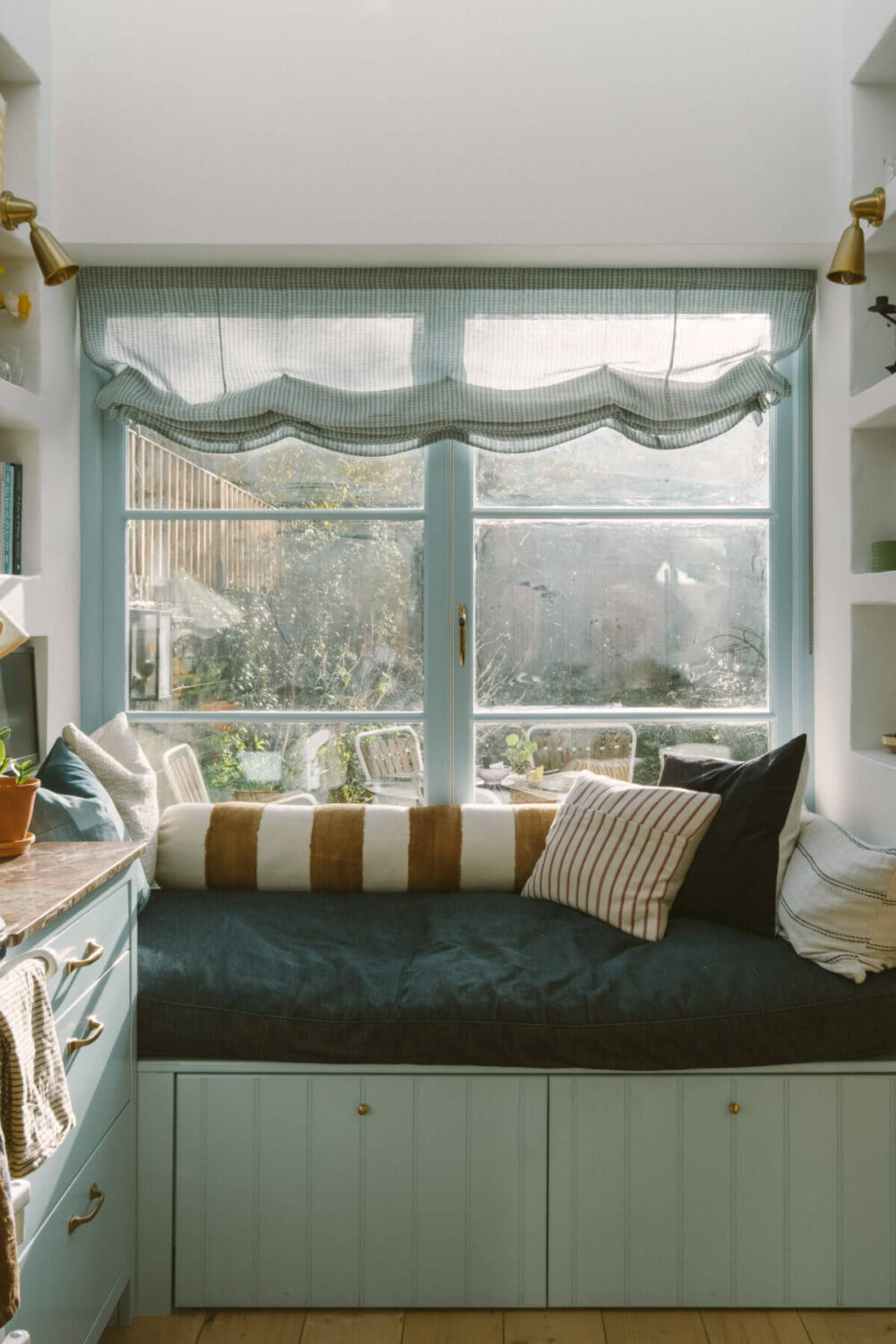 Valspar Color of the Year 2024: Renew Blue 11 window-seat-storage-light-blue-cabinets-nordroom