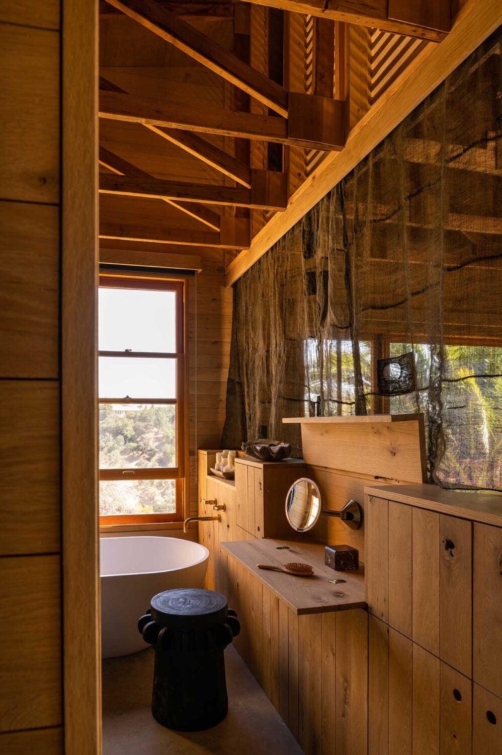 The Warm Mountaintop Home of Actor Hayden Christensen 14 wooden-bathroom-exposed-beams-built-in-storage-nordroom