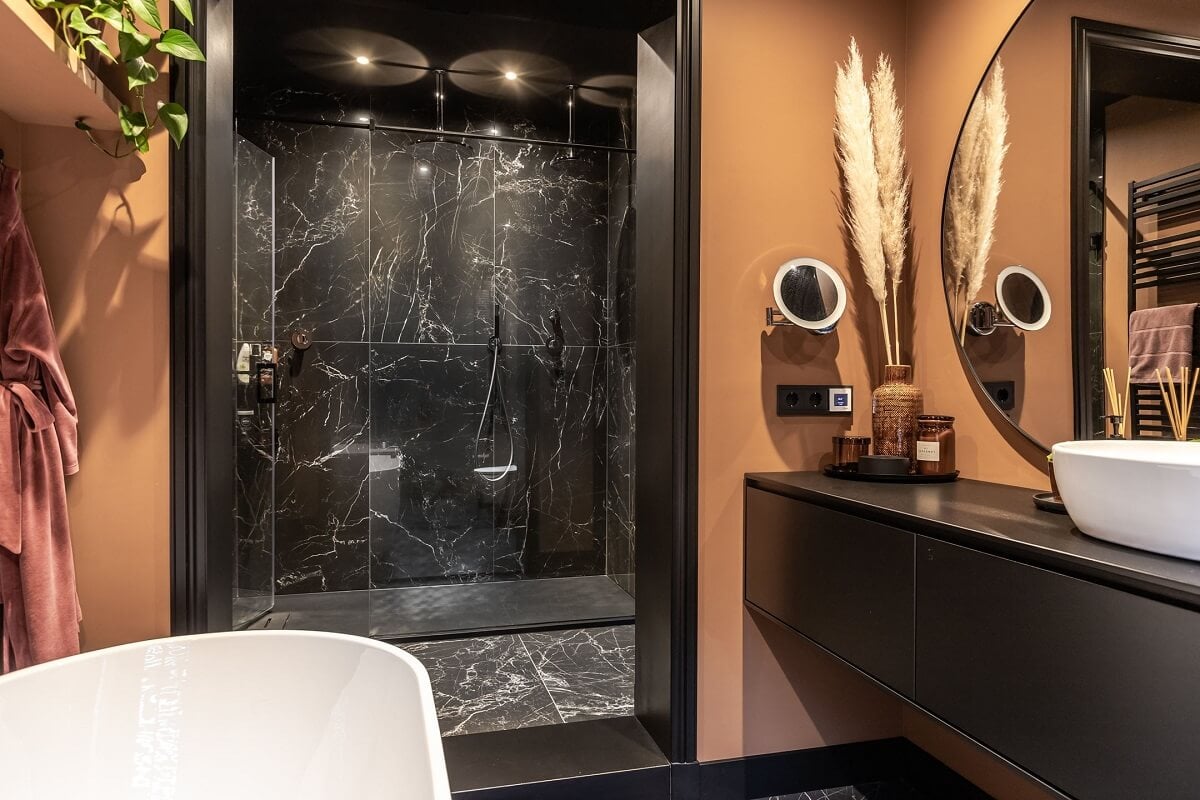 Gray and Earth Tones in a Restored Weavers House in The Netherlands 16 bathroom-black-marble-shower-earthy-wall-color-nordroom