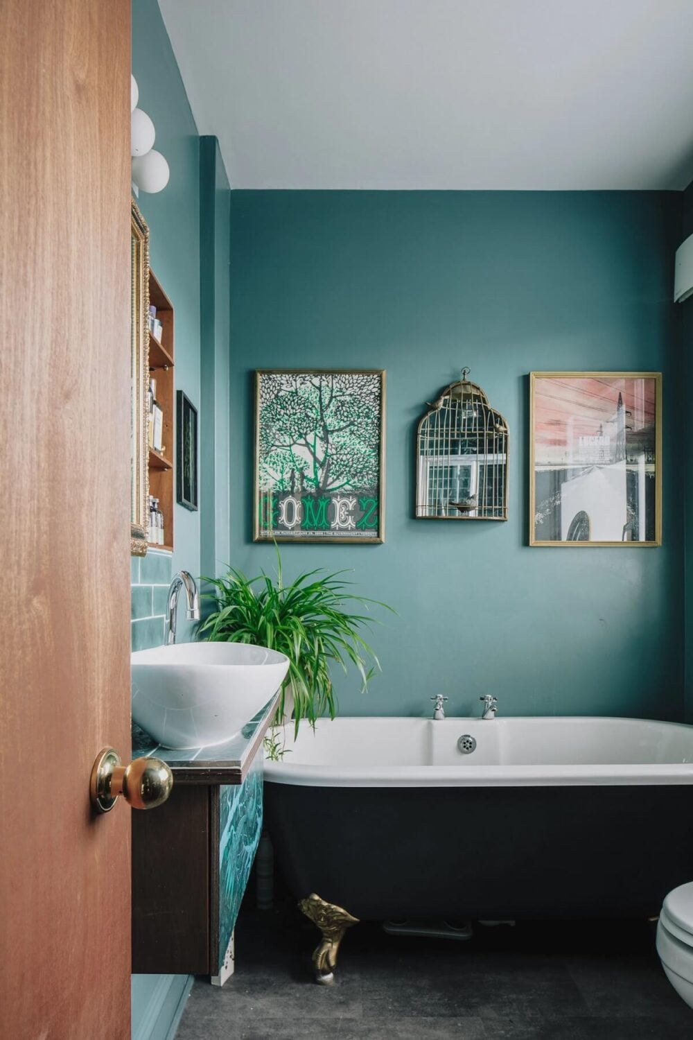A London Home with Moody Rooms and a Pink Kitchen 14 bathroom-green-walls-freestanding-clawfoot-bath-nordroom
