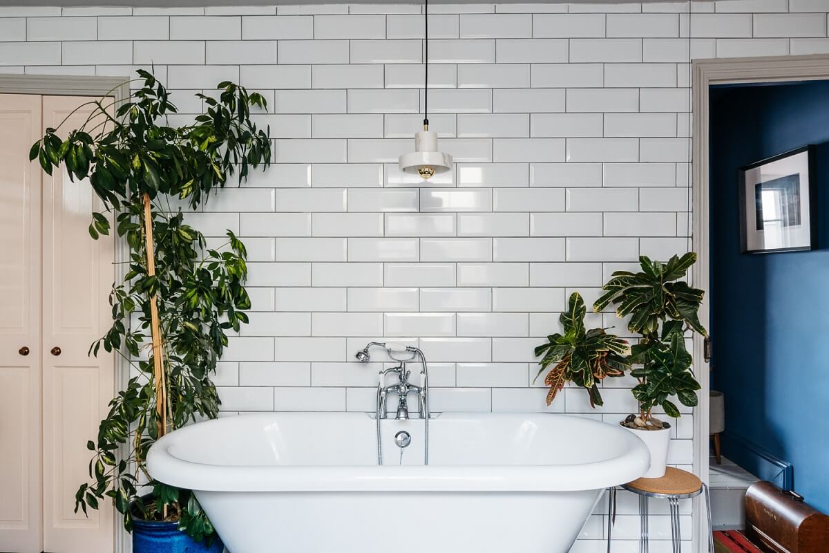 Colorful Rooms in a Historic English Home 16 bathroom-white-tiles-freestanding-bath-nordroom