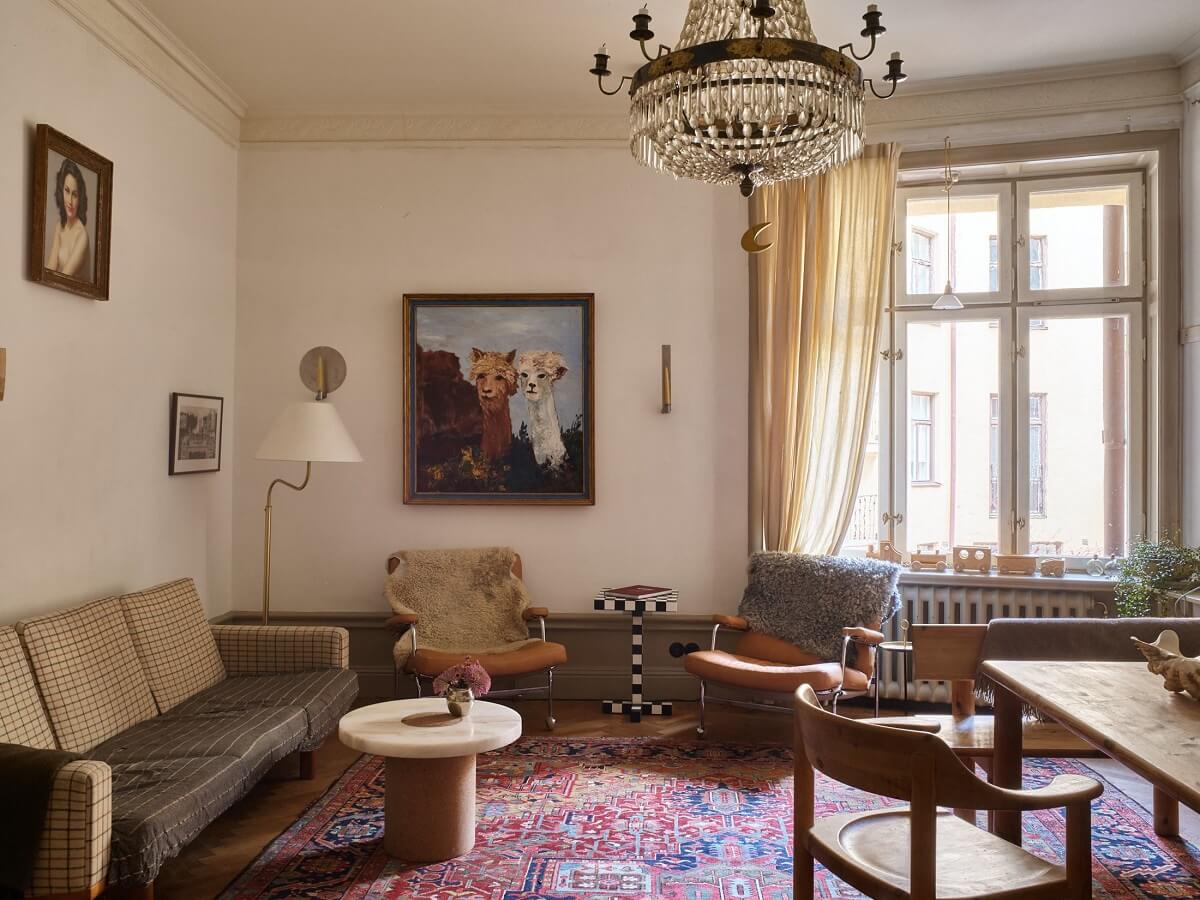 A Beige Vintage Apartment in Stockholm 2 beige-vintage-scandinavian-apartment-large-area-rug-nordroom