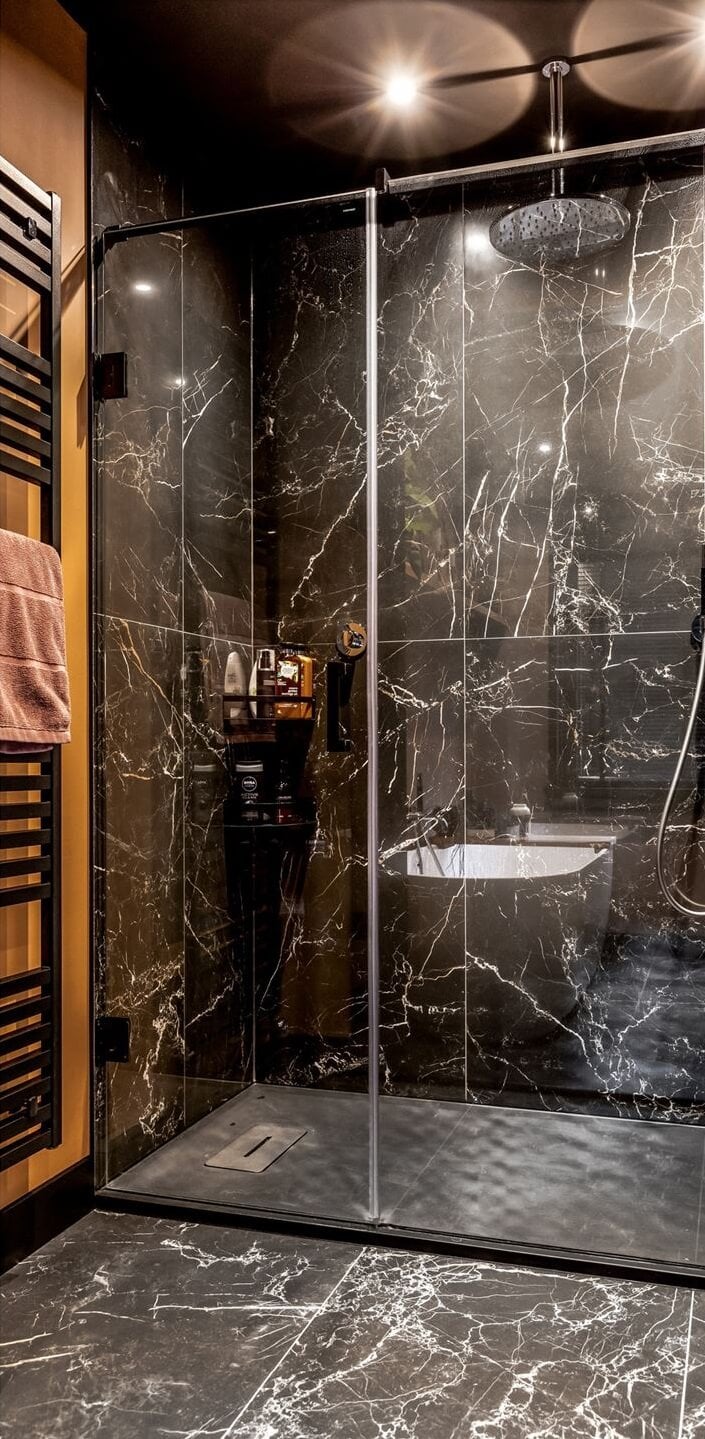 Gray and Earth Tones in a Restored Weavers House in The Netherlands 17 black-marble-shower-bathroom-nordroom