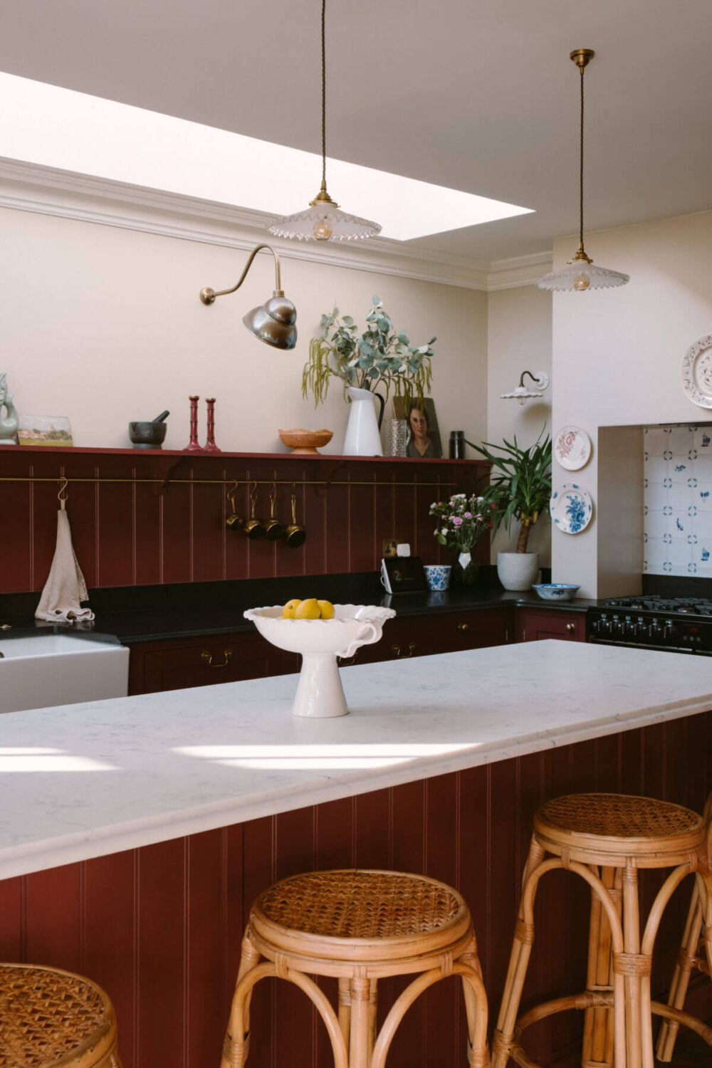 A Deep Red Kitchen in a Victorian Home in London 11 breakfast-bar-deep-red-devol-kitchen-skylight-nordroom