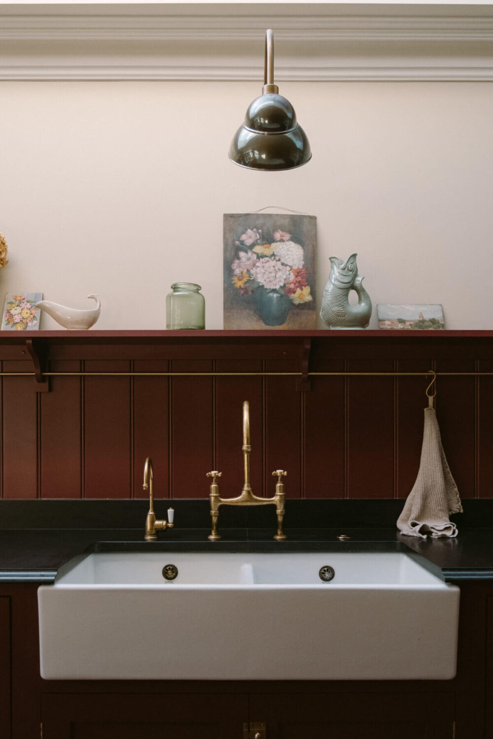 A Deep Red Kitchen in a Victorian Home in London 13 butler-sink-deep-red-kitchen-devol-ledge-nordroom