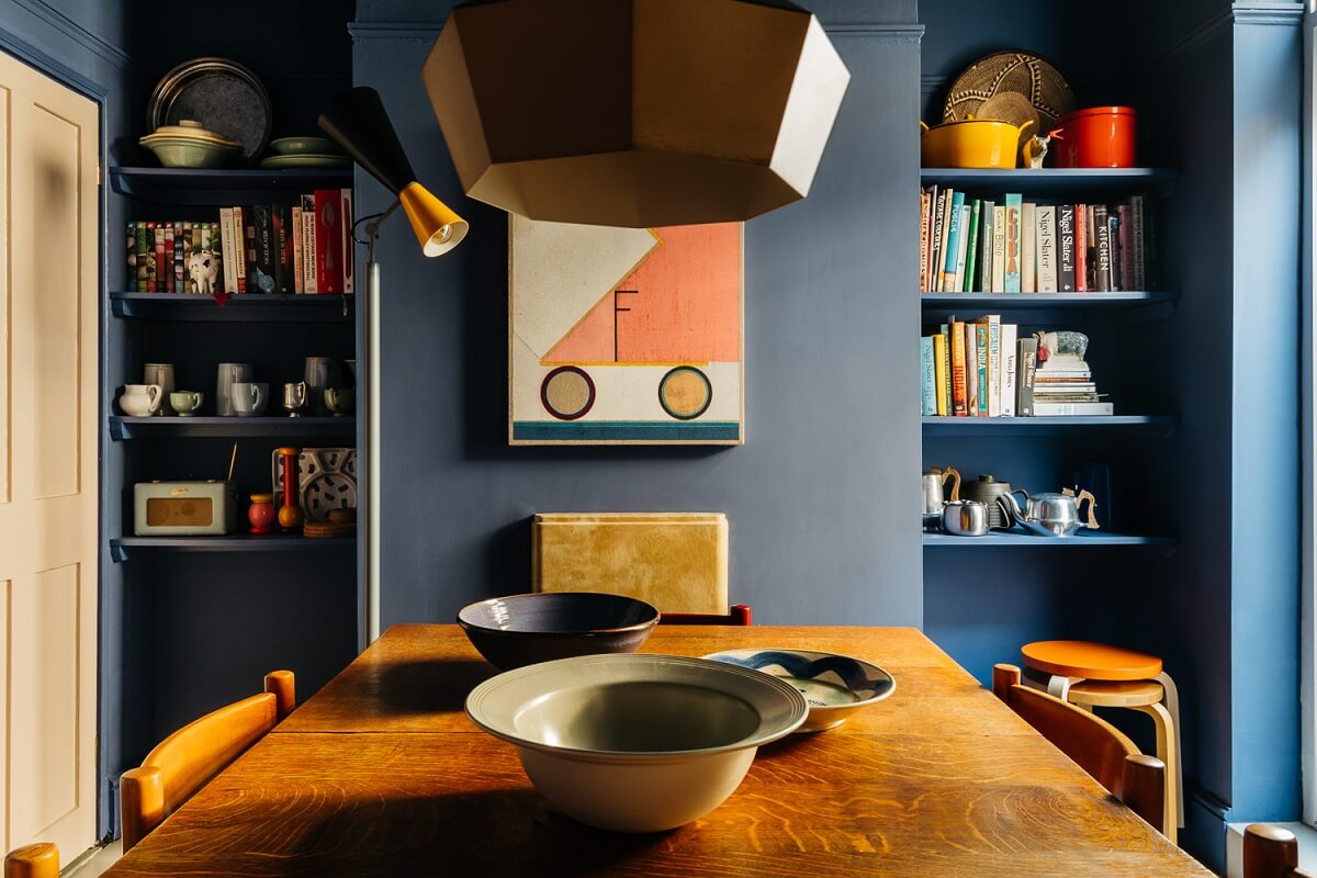 Colorful Rooms in a Historic English Home 9 dark-blue-walls-ceiling-dining-room-bookshelves-nordroom