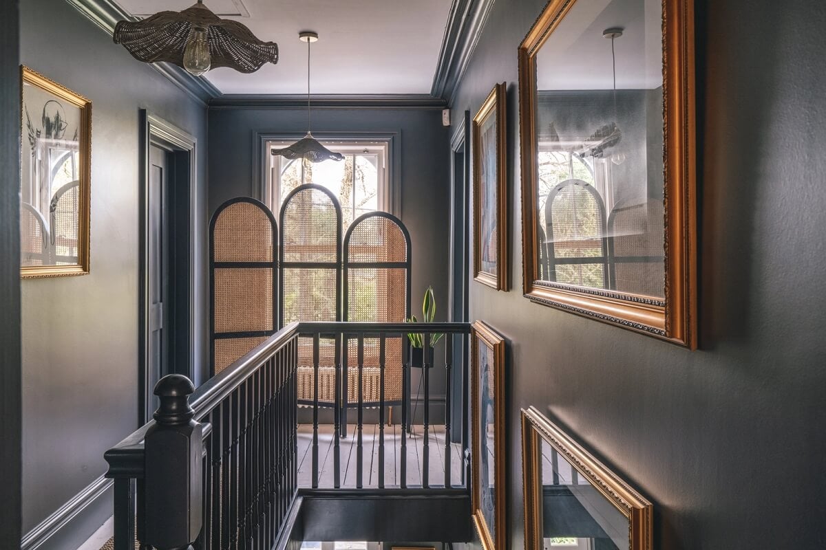A Victorian Home with a Modern Black Extension 15 dark-gray-painted-landing-english-home-nordroom