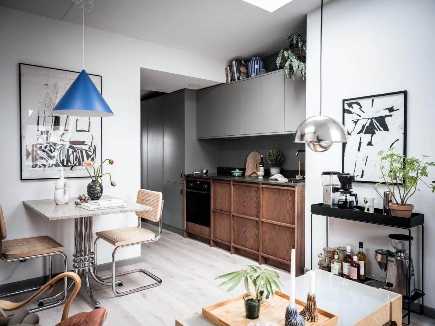 A Small Scandinavian Loft with Skylights and Brick Wall 10 dark-stained-oak-kitchen-nordiska-kök-small-loft-apartment-nordroom