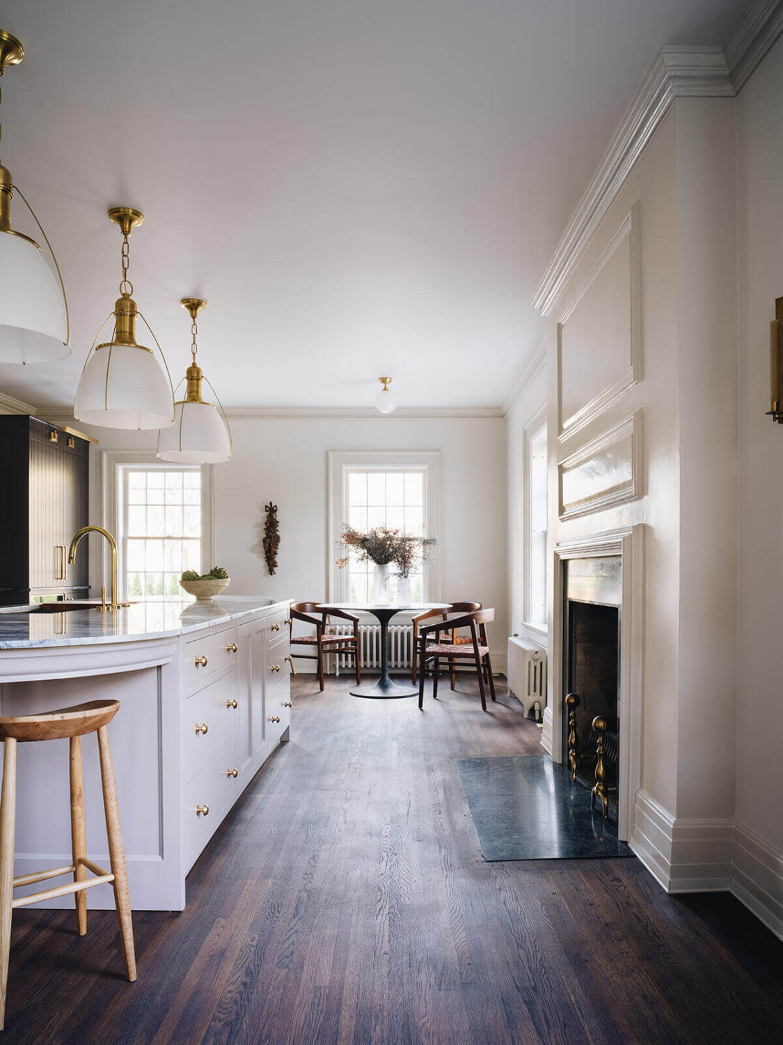 A Classic 1930s Home in Grand Rapids Designed by Jean Stoffer 12 dark-wooden-floor-fireplace-window-seat-kitchen-island-nordroom