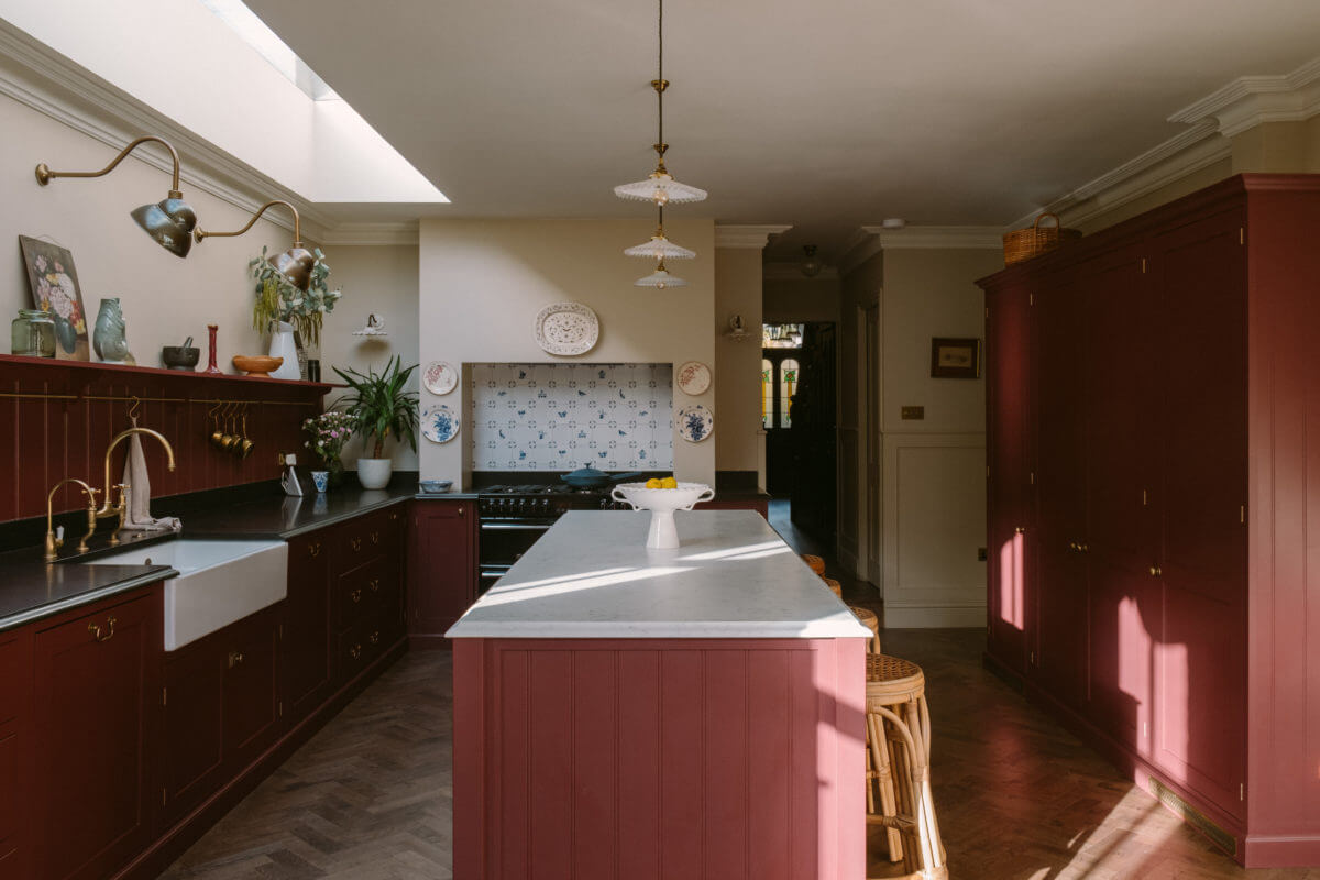 A Deep Red Kitchen in a Victorian Home in London 7 deep-red-devol-kitchen-island-wooden-floor-skylight-nordroom