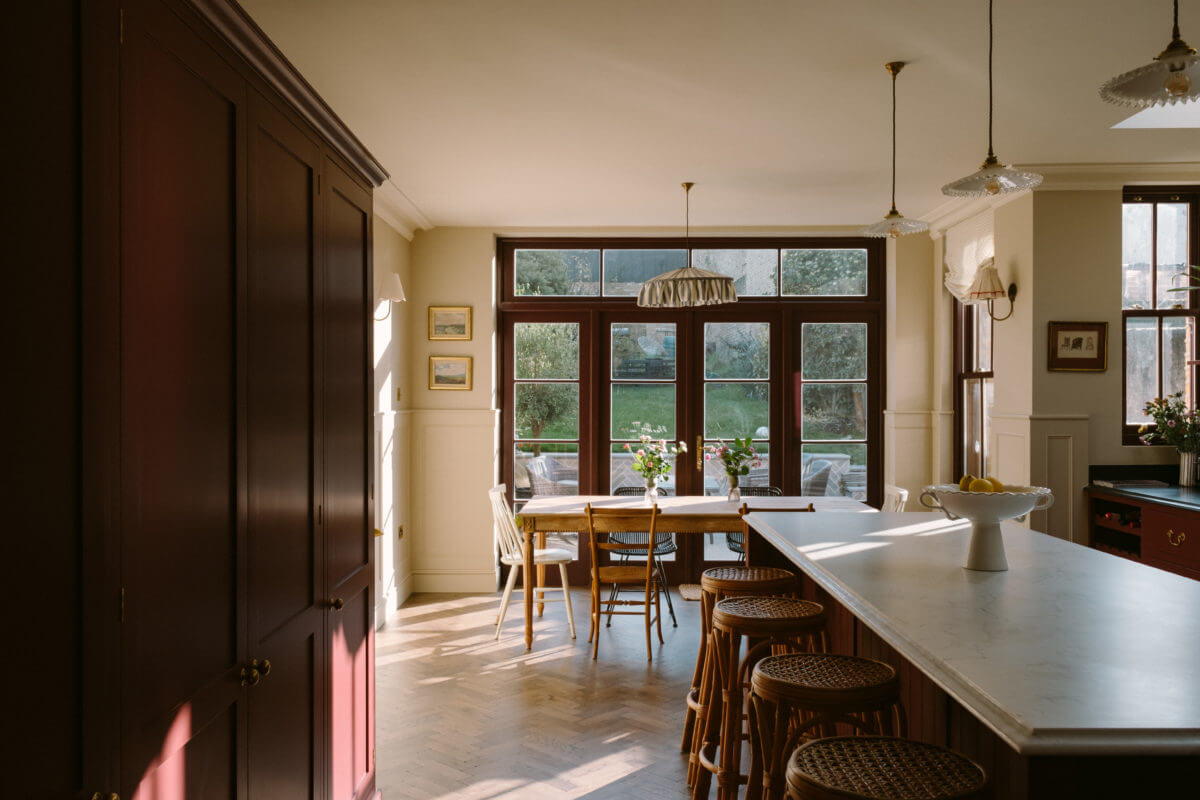 A Deep Red Kitchen in a Victorian Home in London 14 deep-red-kitchen-island-built-in-cabinets-dining-table-victorian-house-nordroom